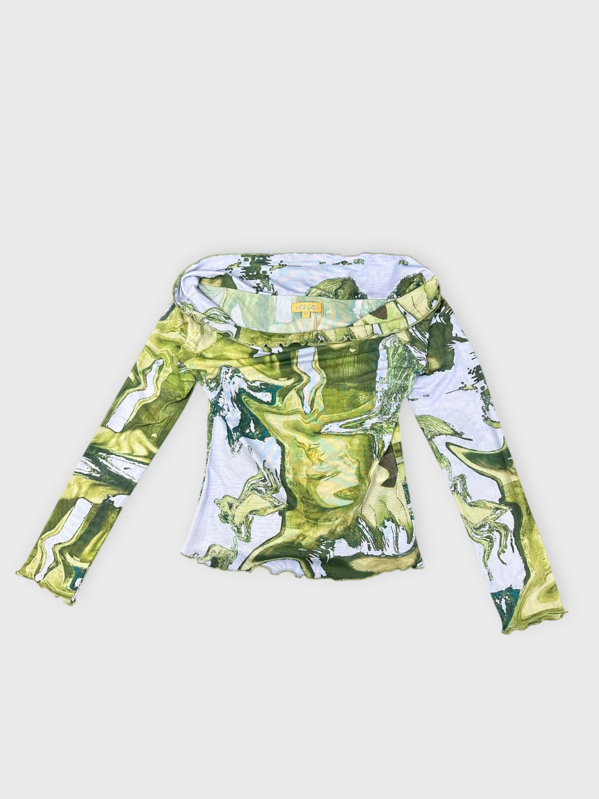 Abstract print long sleeve top in green detail view