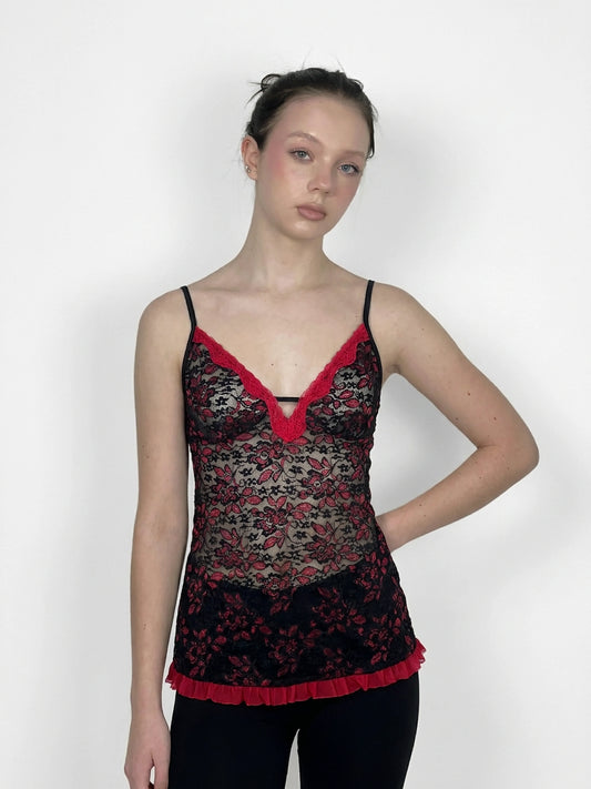Black lace camisole featuring red trim, shown in front view.