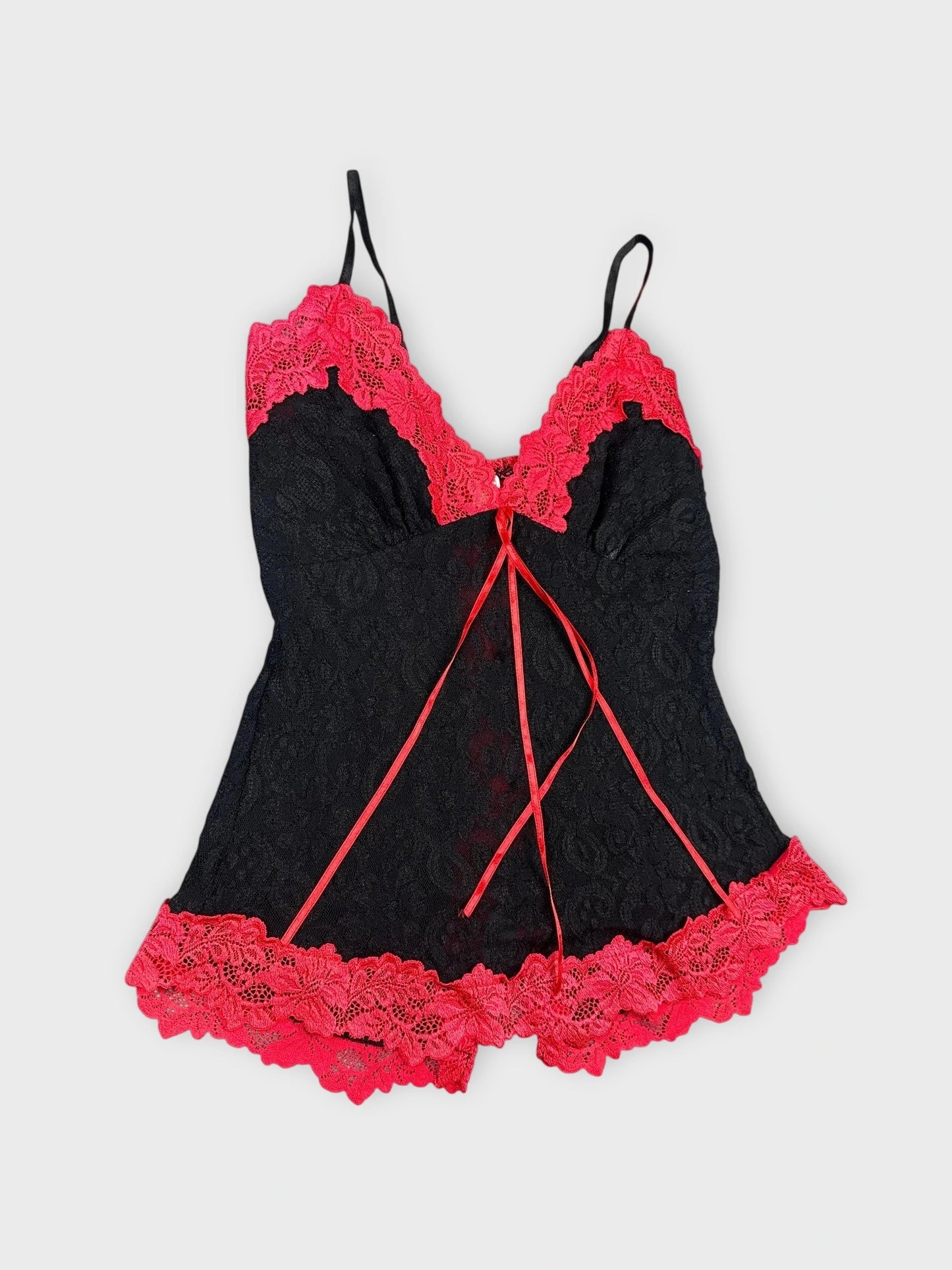 Black lace crop top with red lace trim detail view