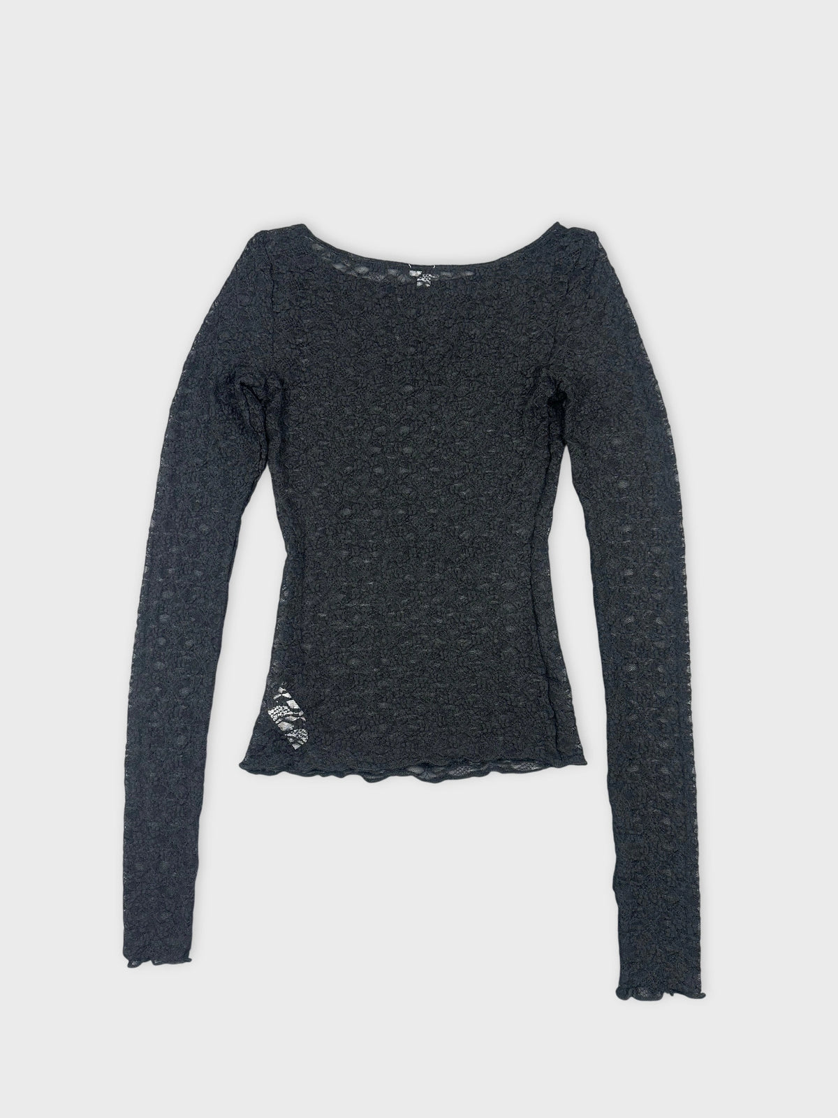 Black lace long sleeve top back view with scalloped trim and textured pattern