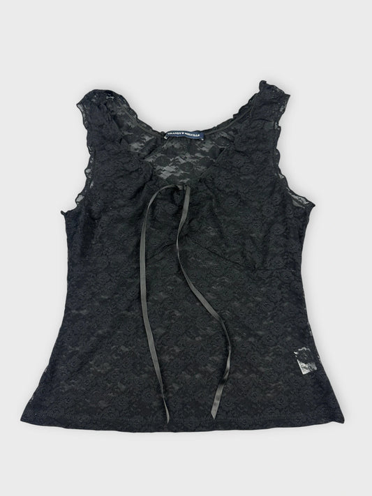 Black lace top with floral details front view featuring a tie and delicate pattern.