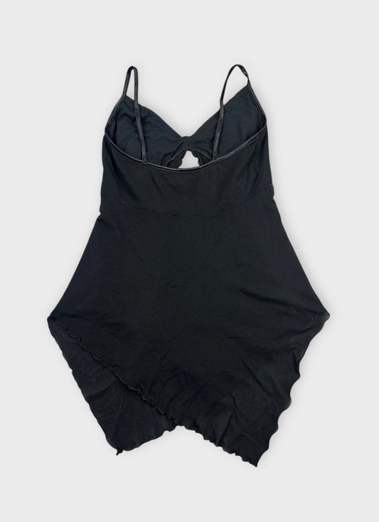 Back view of a black sheer cami top with lace trim.
