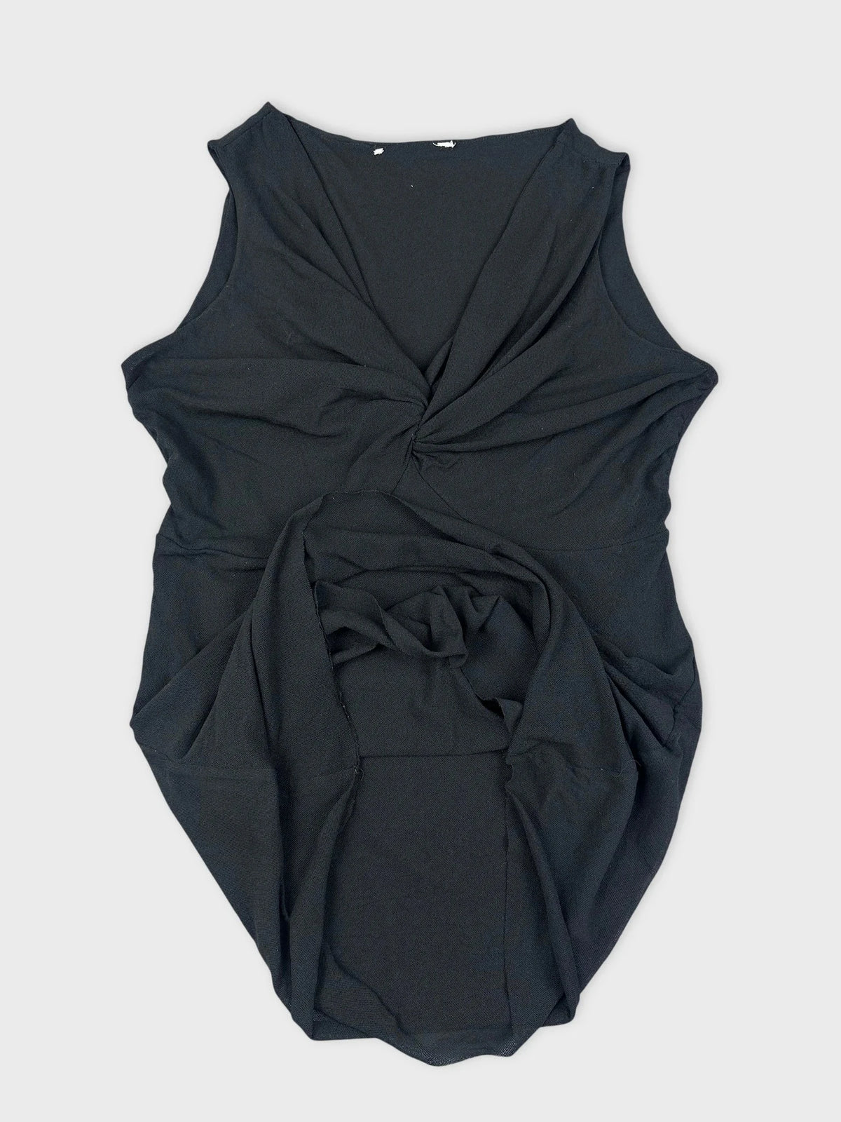 Black sleeveless top with twist detail, showing fabric draping in detail view.