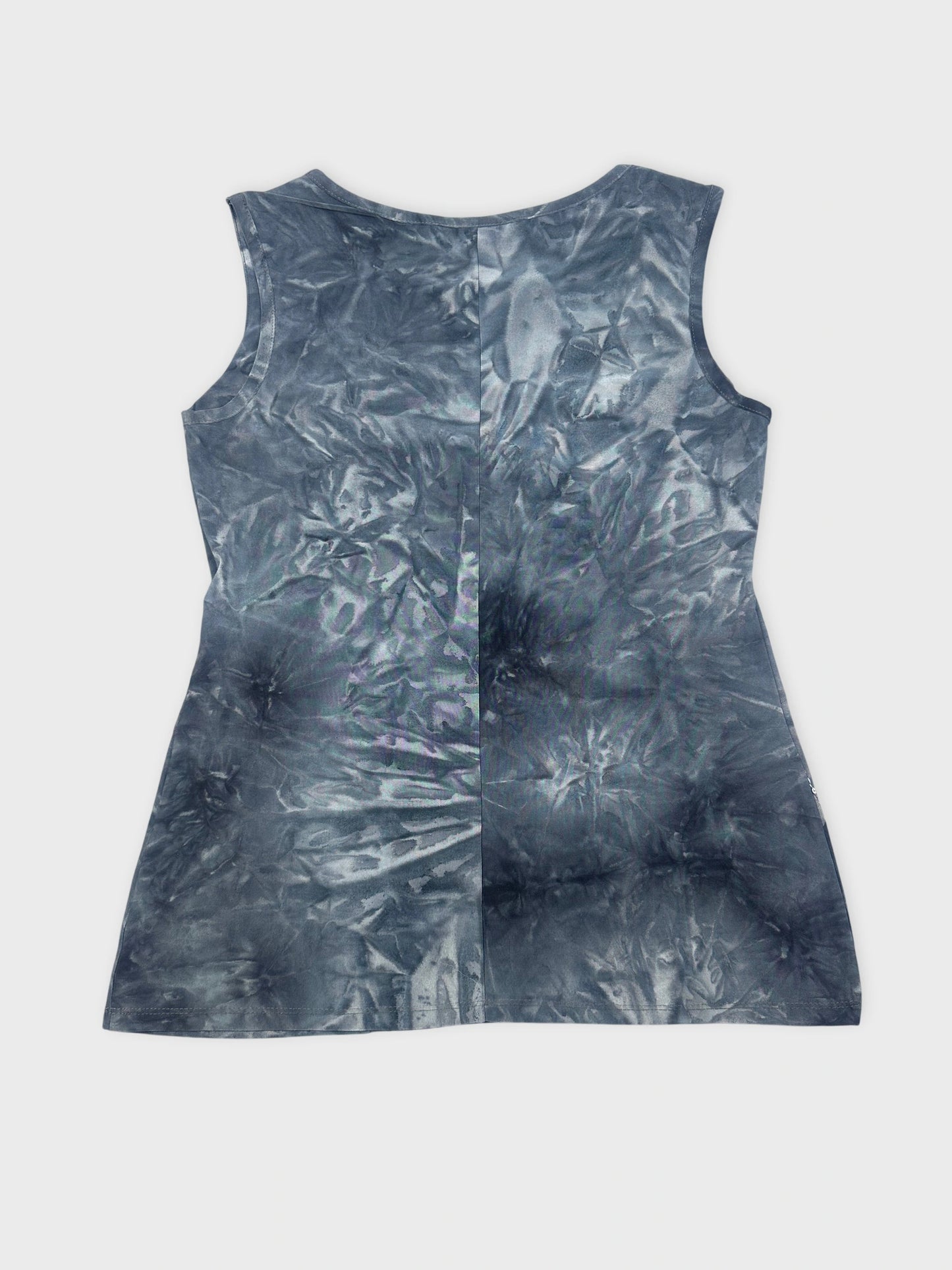 Back view of a blue tie dye sleeveless shirt with a crinkled texture.