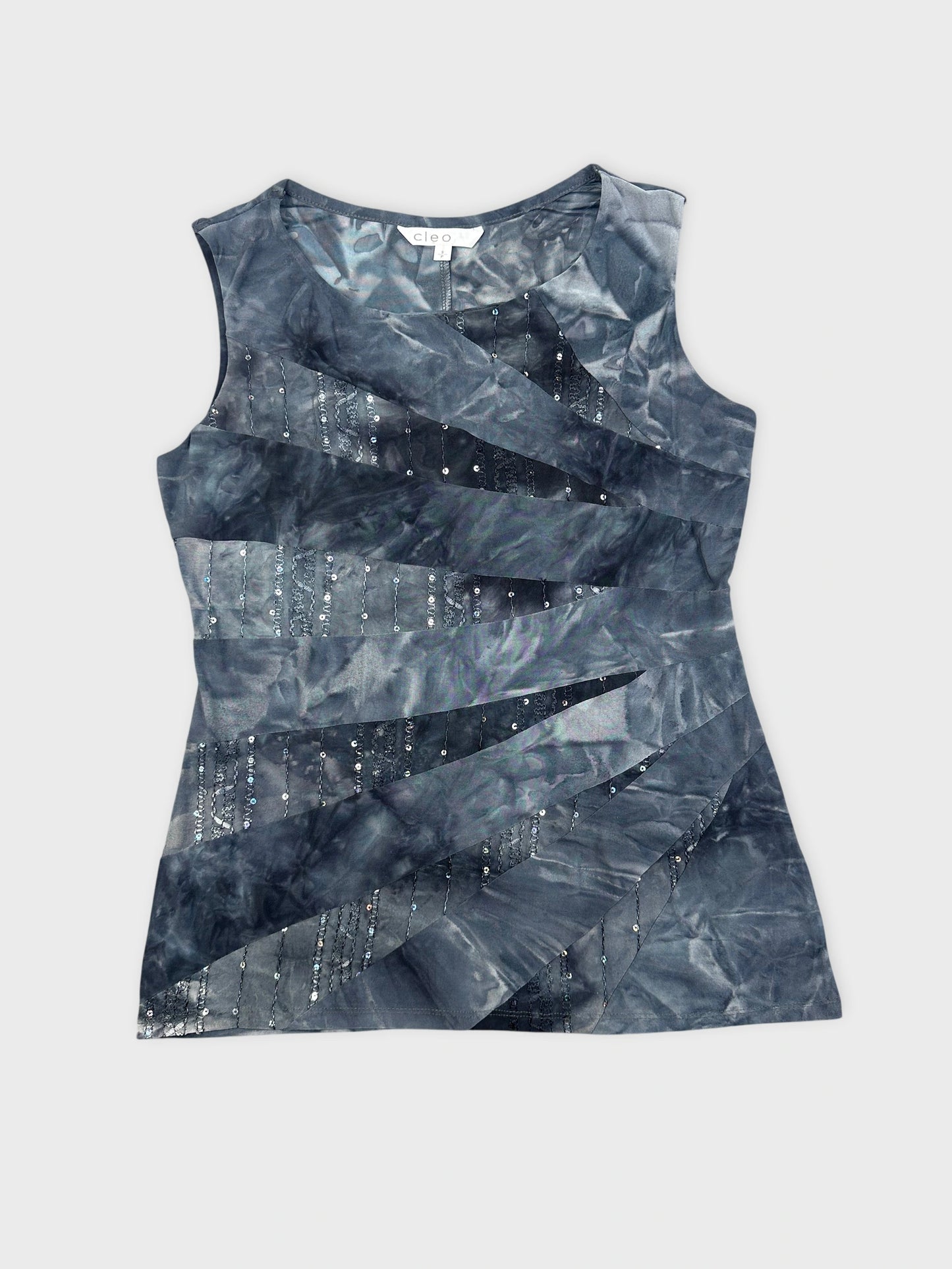 Front view of a blue tie dye sleeveless shirt with sequin detail.
