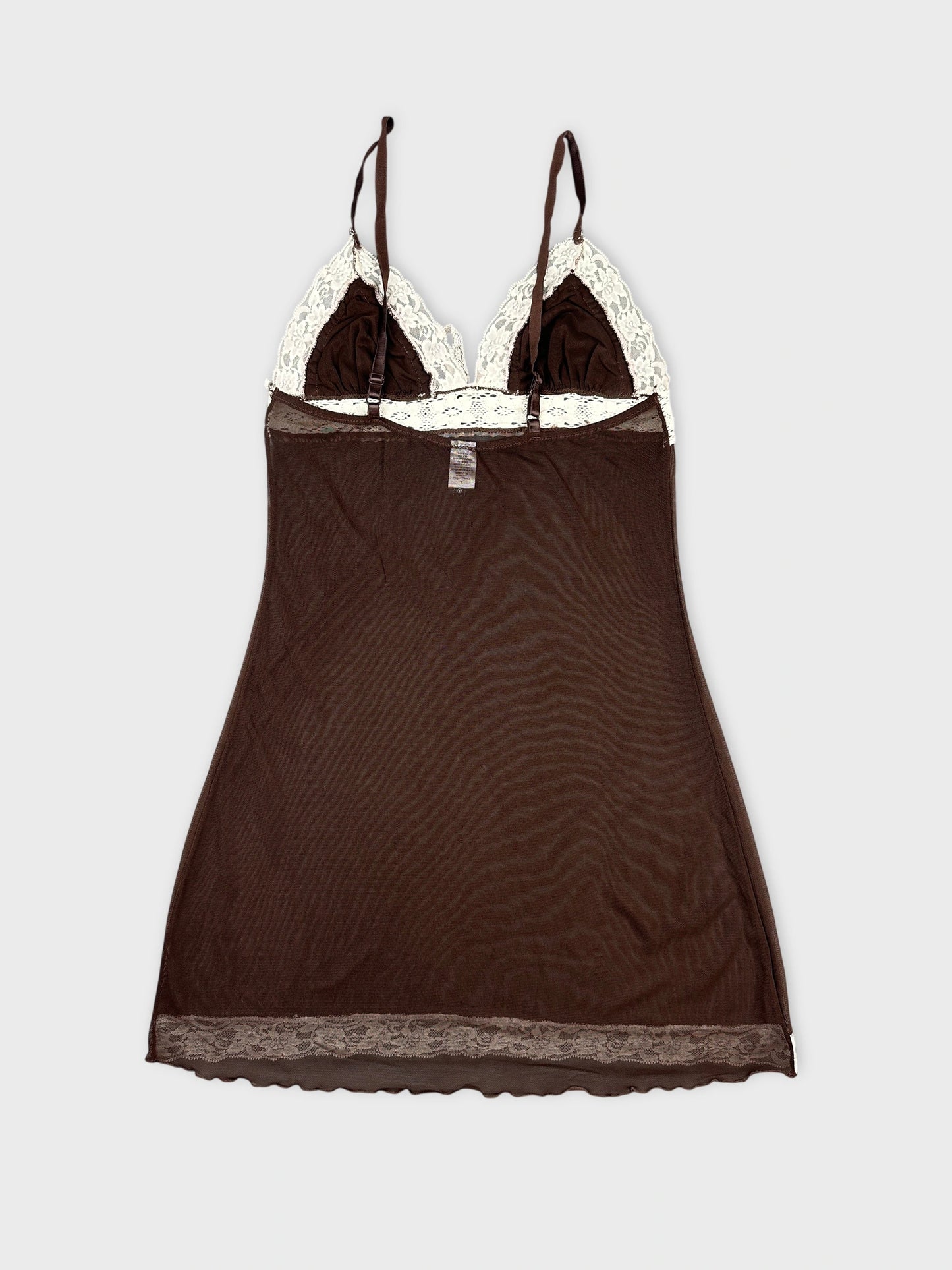 Back view of a brown mesh crop top with lace trim details.