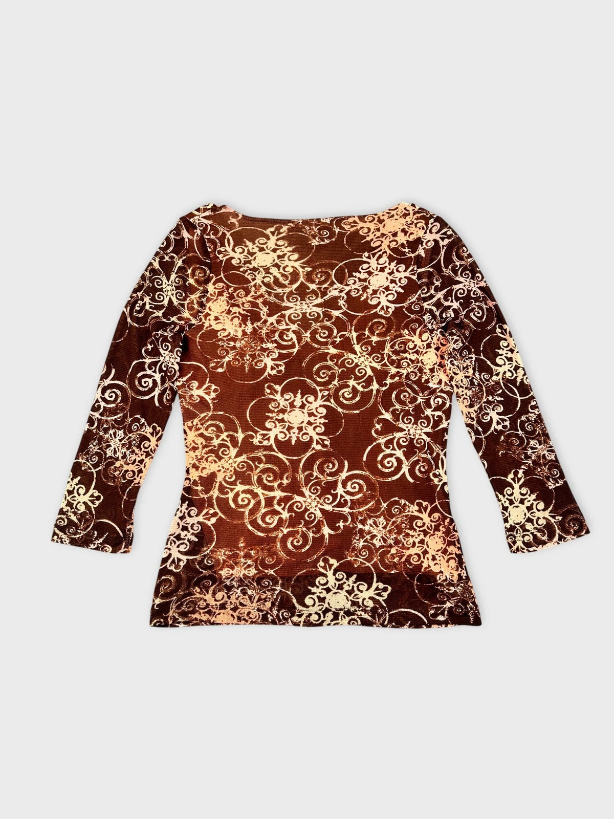Back view of a brown sheer long sleeve top with floral print.