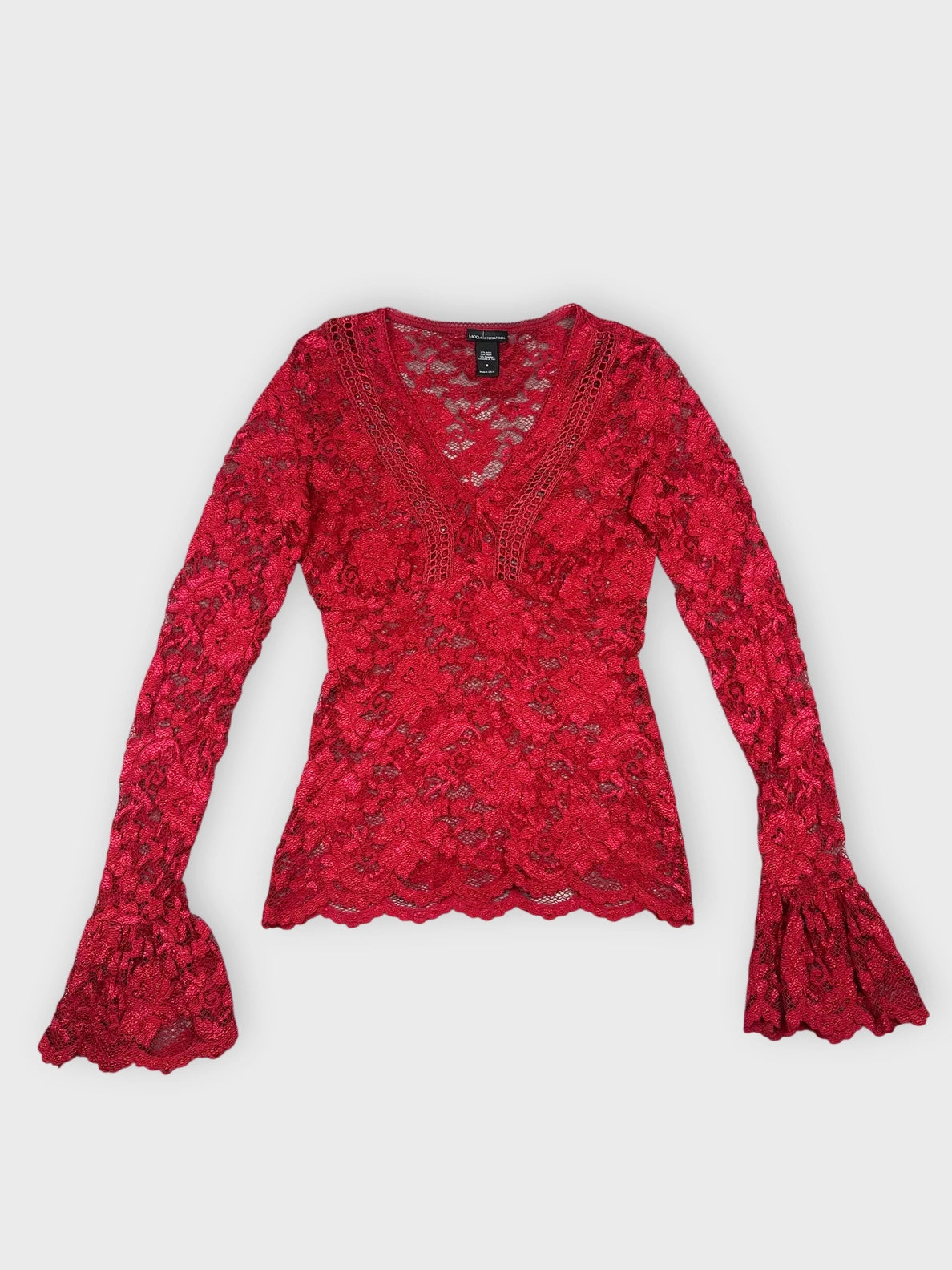 Burgundy lace blouse with flared sleeves front view showing floral pattern and V-neck