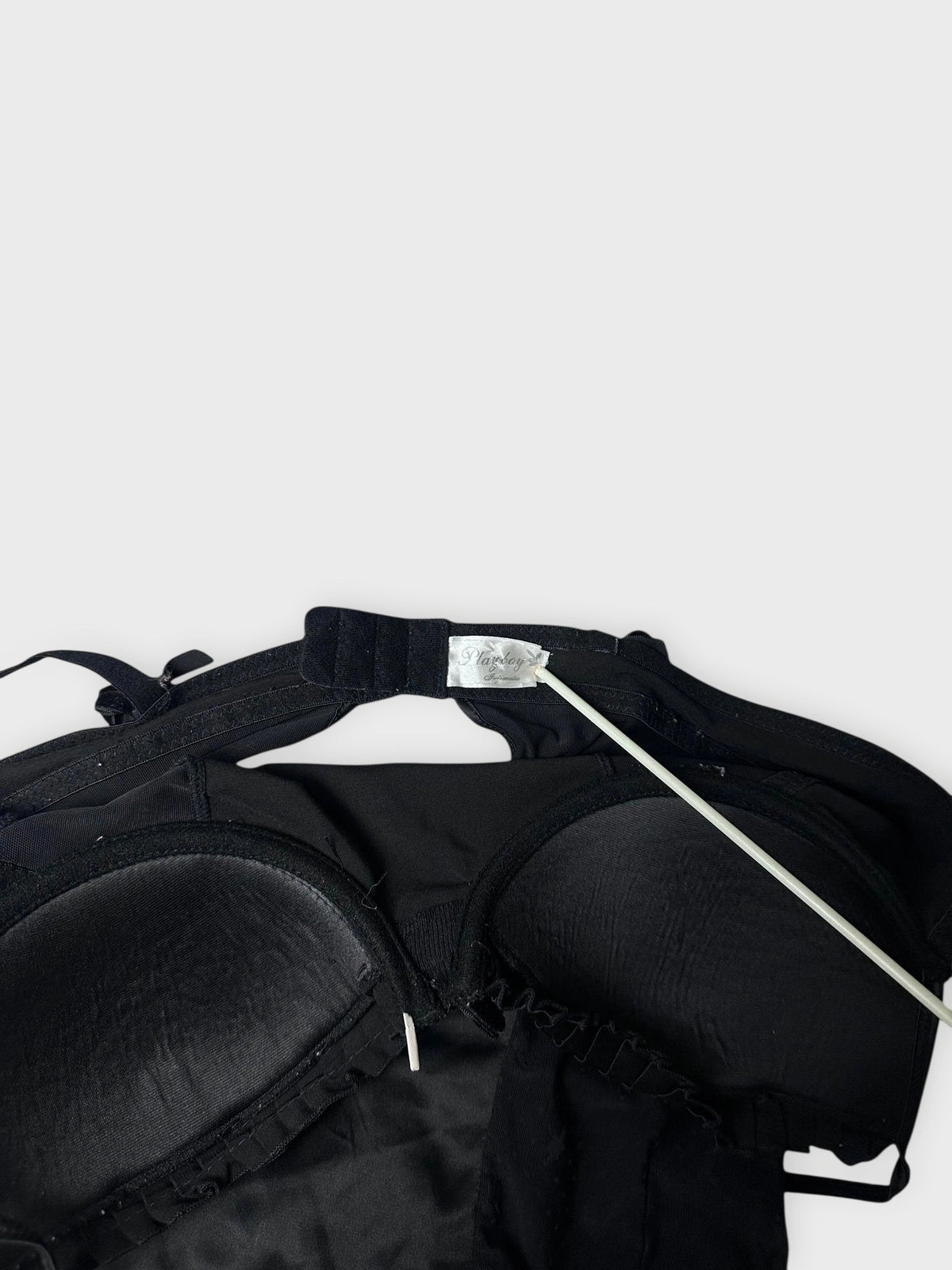 Camisole in black with padded cups detail view