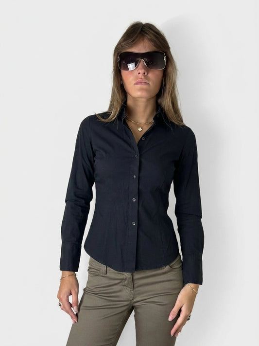 Chic black button-up shirt with fitted shape, shown in front view.