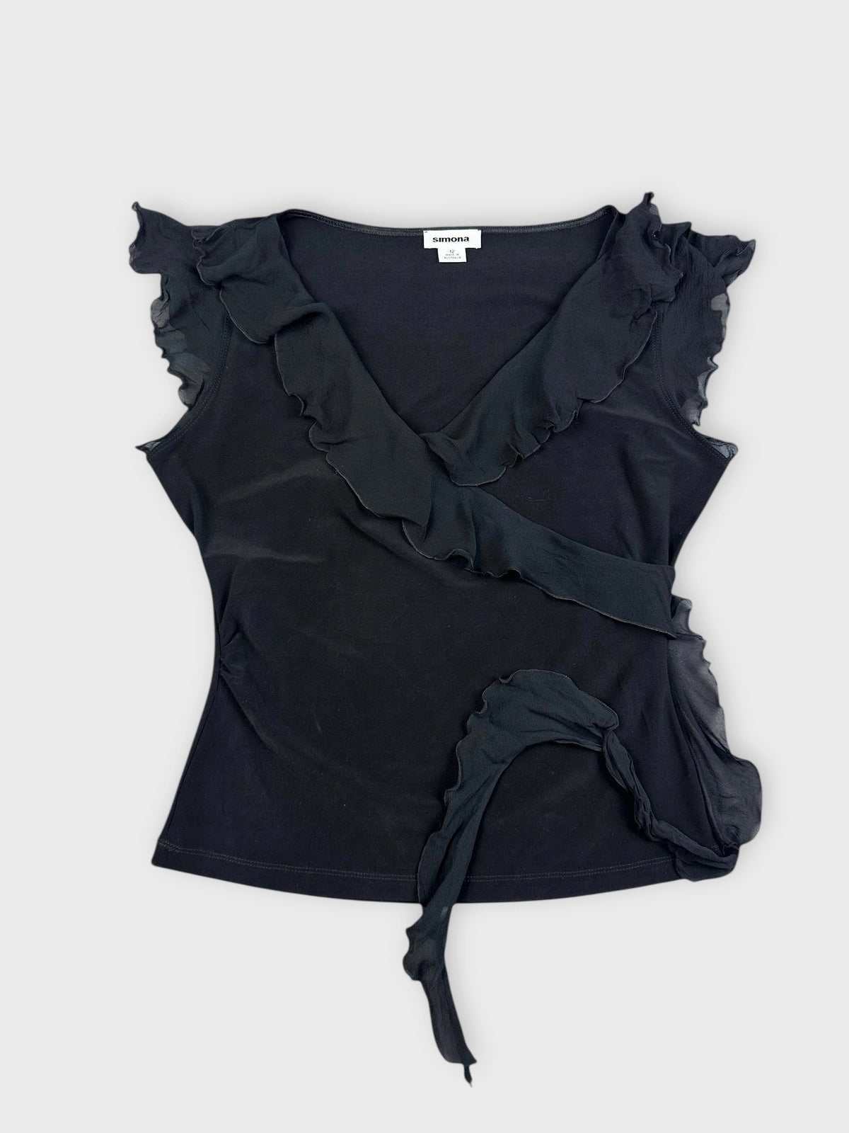 Chic black ruffle wrap top with ruffled sleeves front view