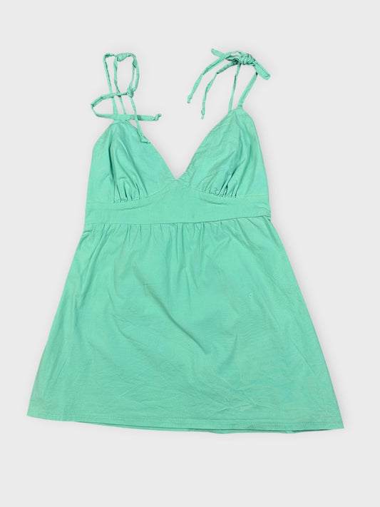 Mint green mini dress with adjustable straps front view