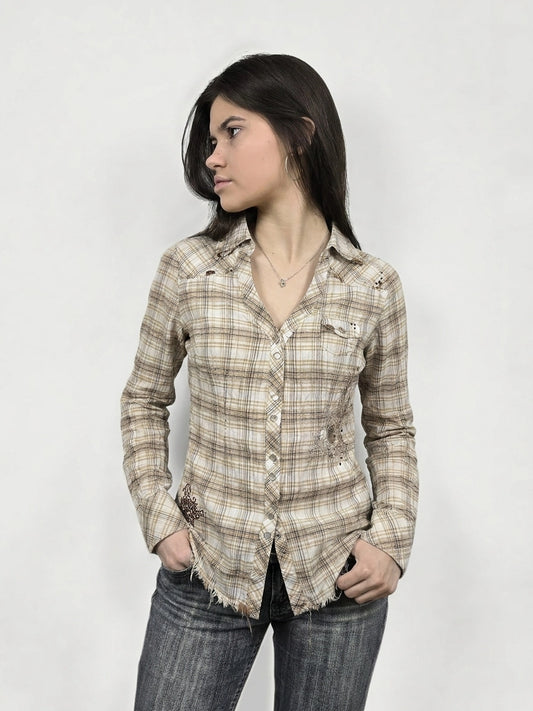 Front view of a beige plaid button-up shirt with frayed hem.
