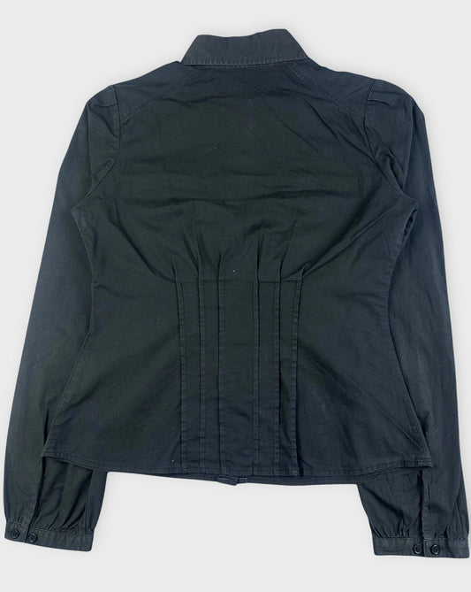 Back view of a black ruched button-up shirt with gathered detail.