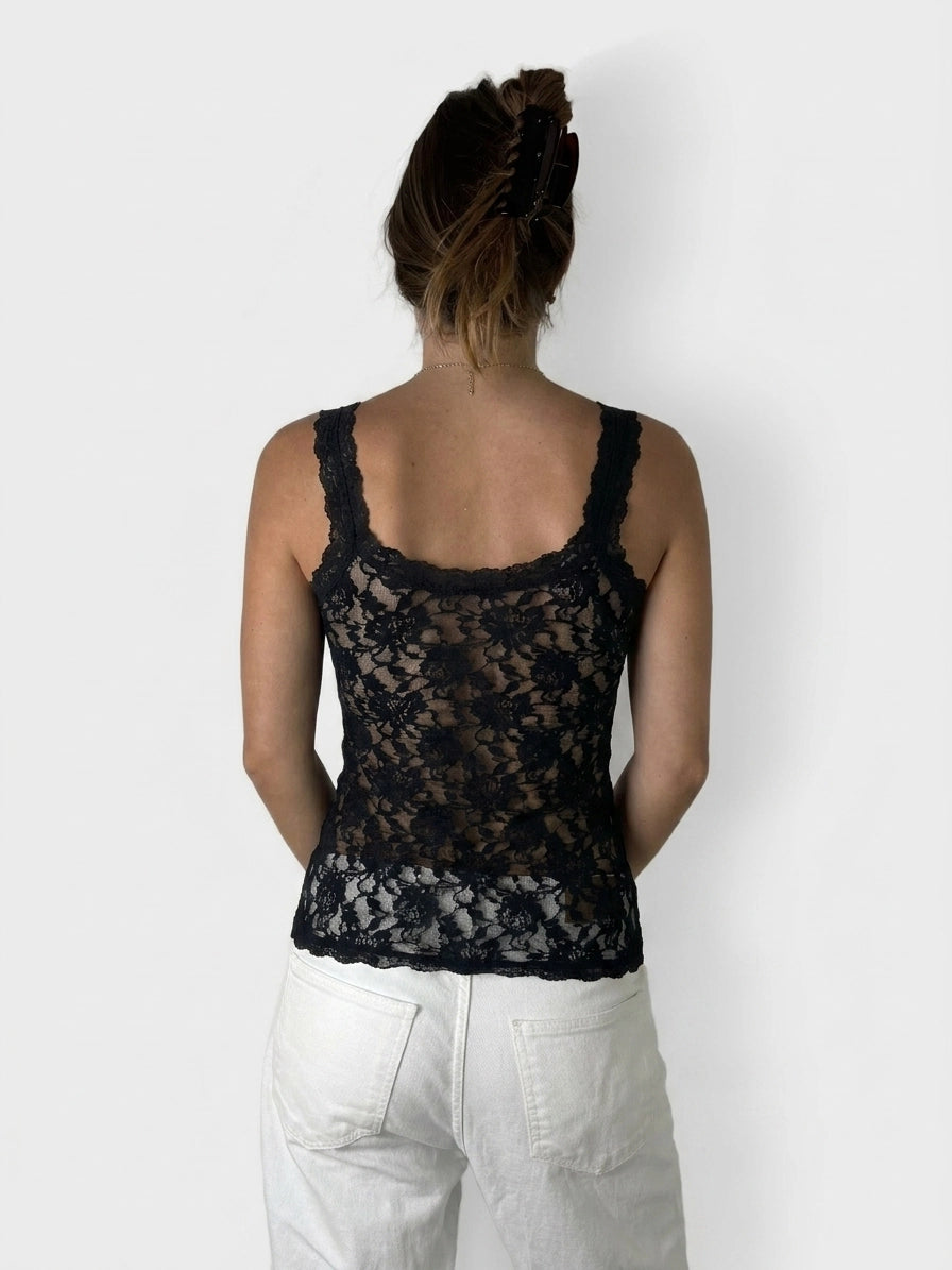 Edgy black lace tank top with sheer detailing front view.