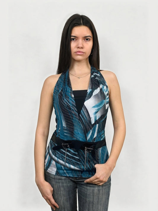Front view of blue halter top featuring a leaf print and leather belt.