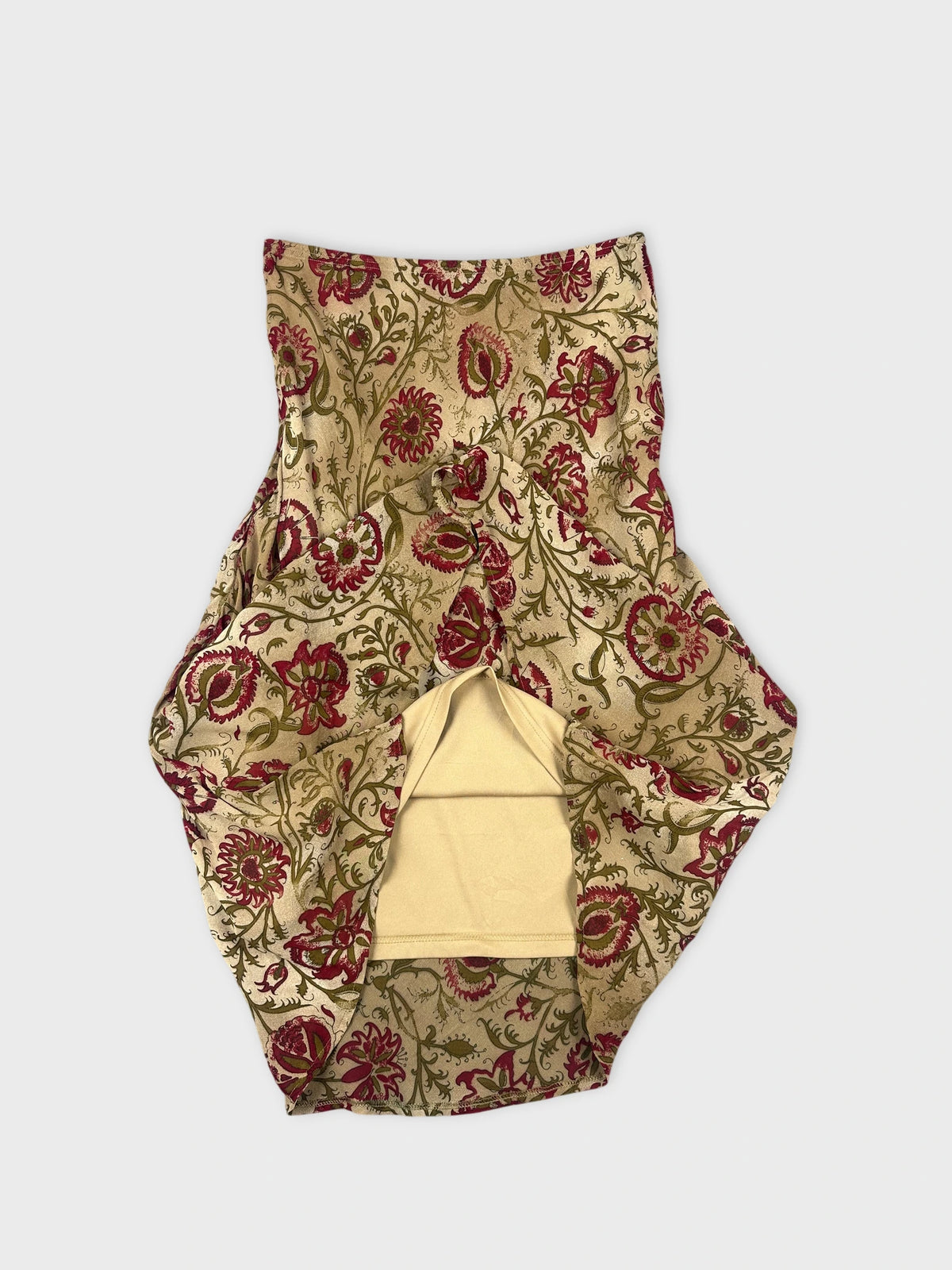 Floral maxi skirt in beige with red print detail view.