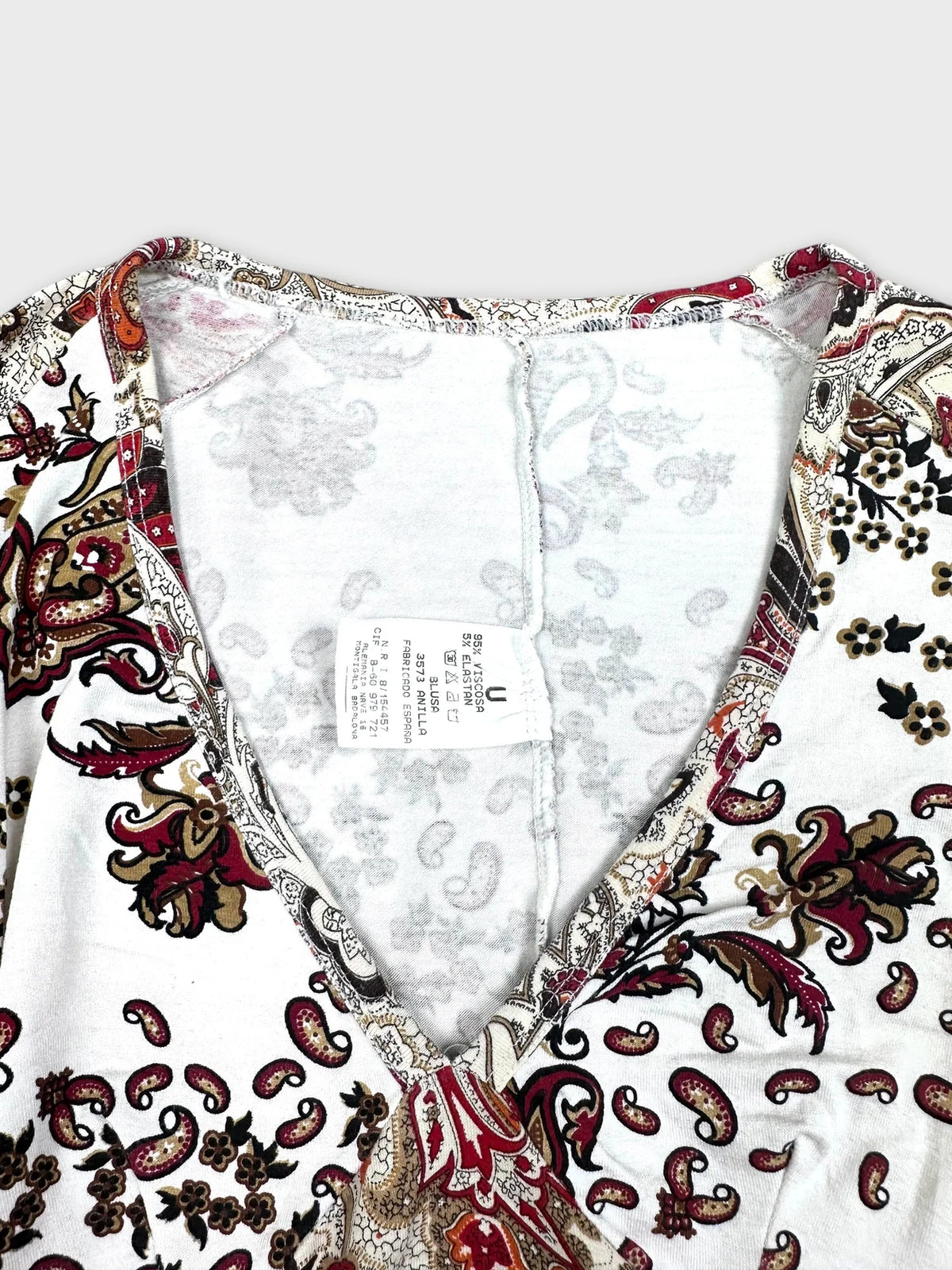 Floral paisley print long-sleeve V-neck top detail view