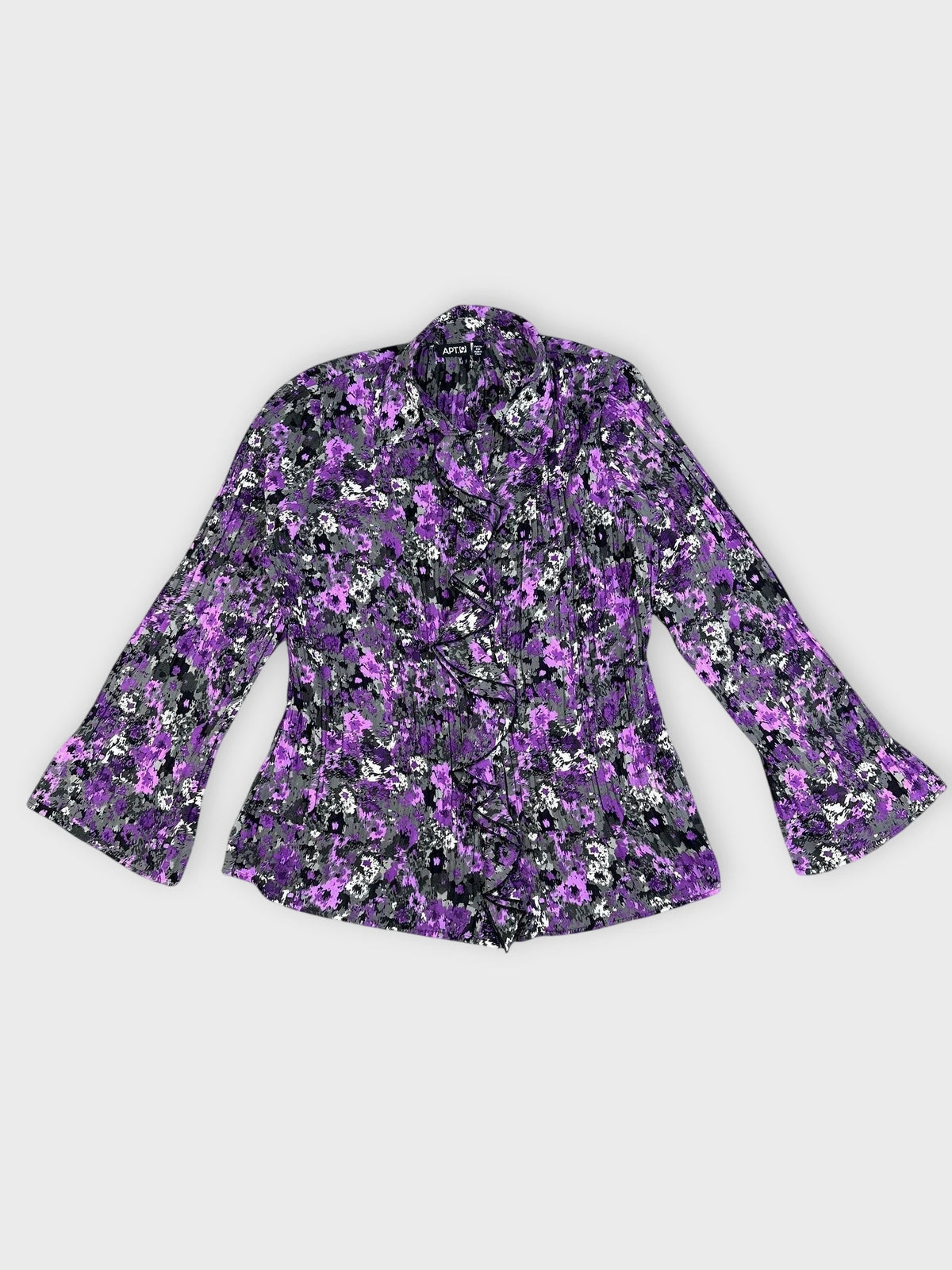 Floral ruffle blouse in purple with bell sleeves front view