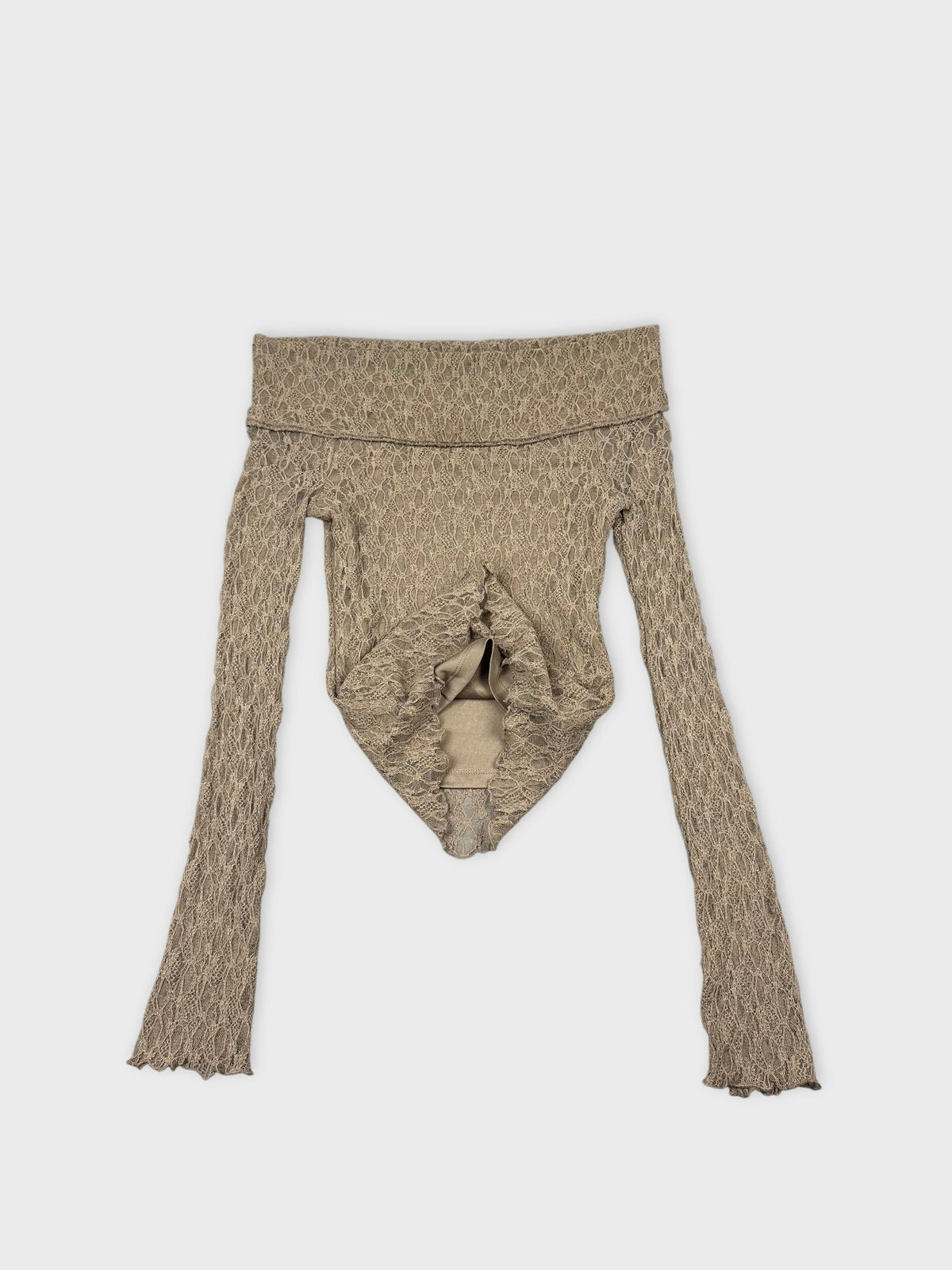 Lace long sleeve top in beige with ruffled trim detail view.