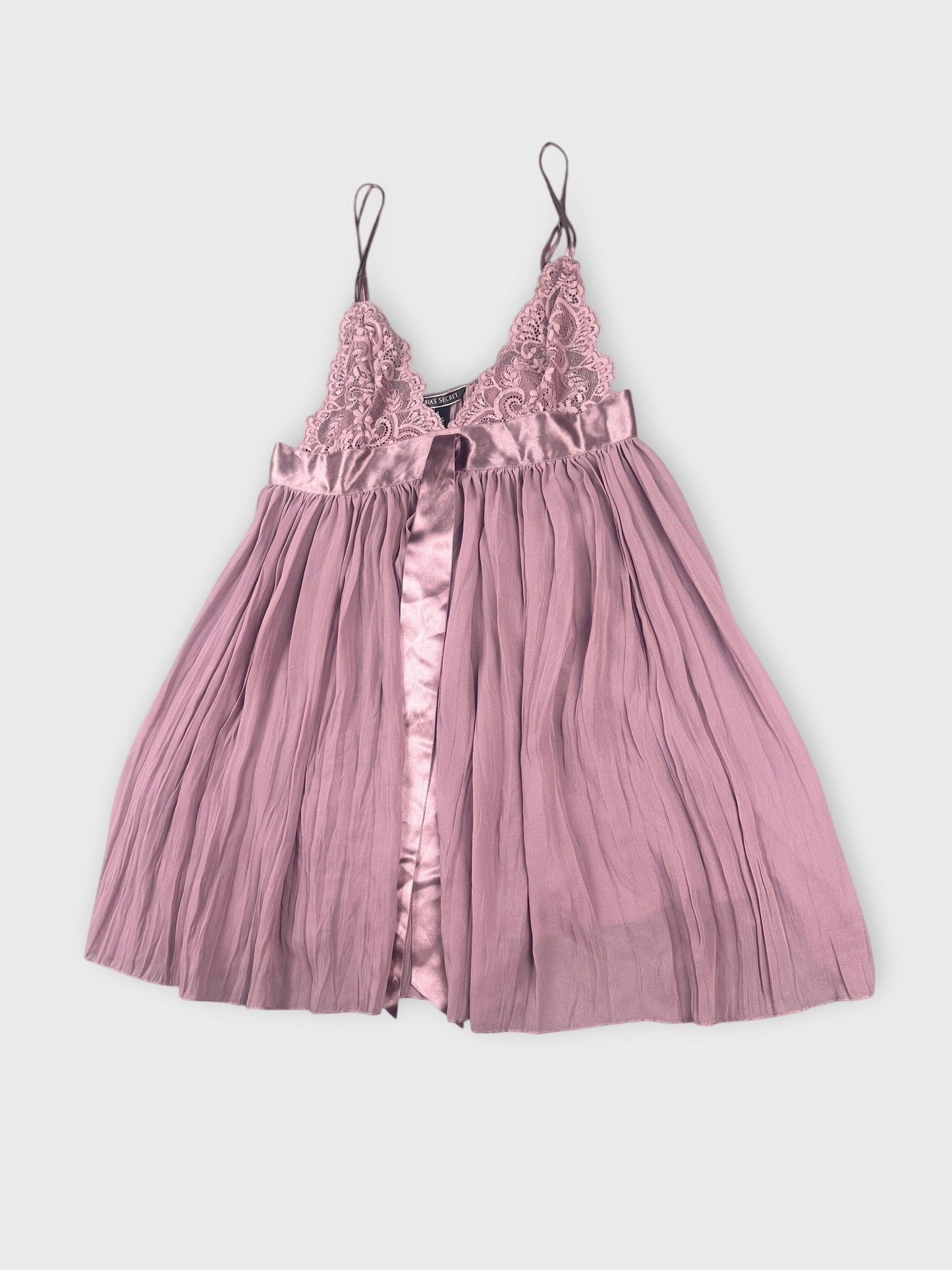 Detail view of lavender lace bralette with pleated silk detail.