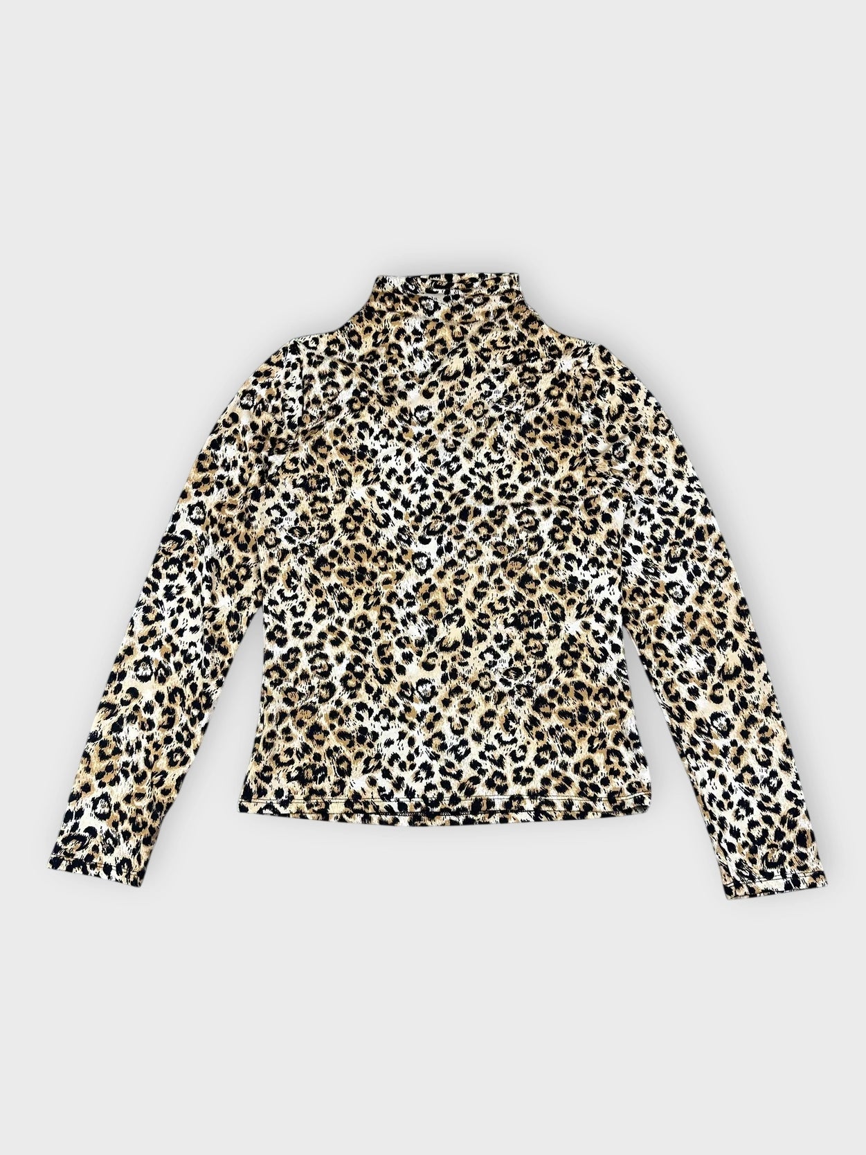 Back view of a leopard print long sleeve top with a high collar.