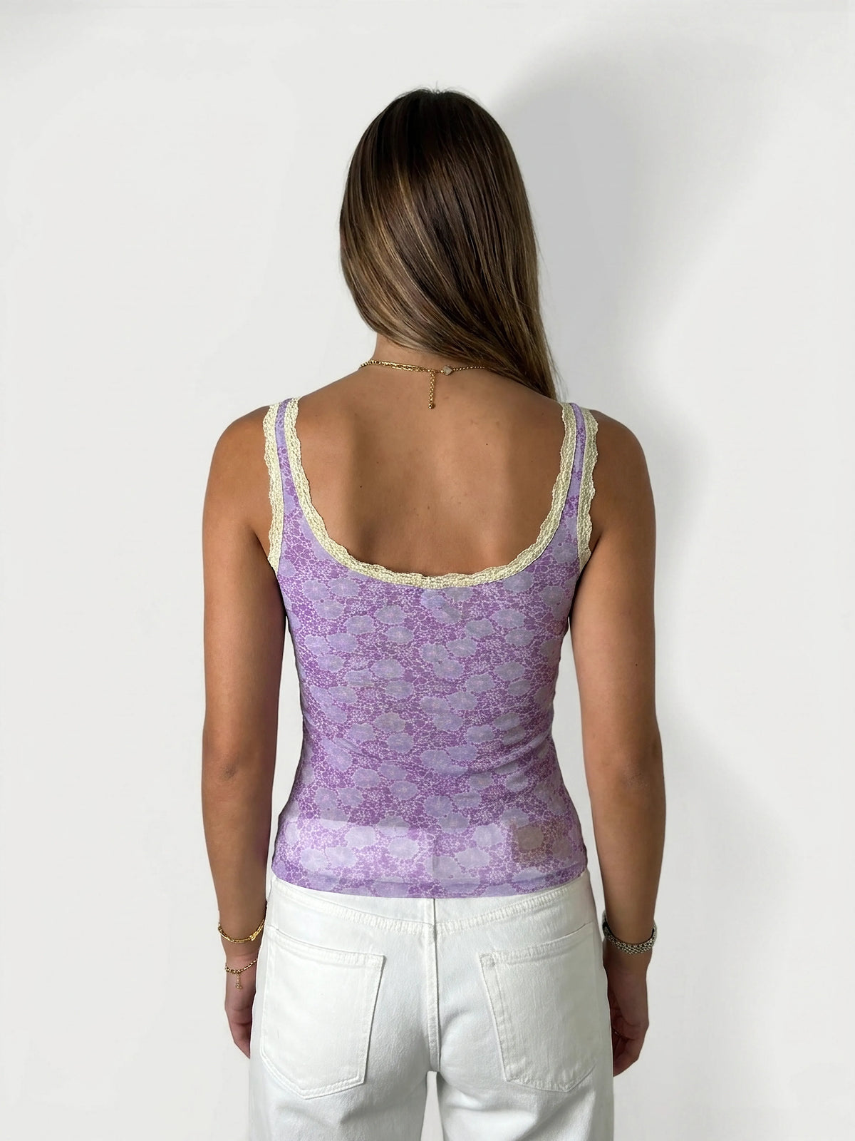 Back view of lilac floral lace trimmed tank top with lace detailing.
