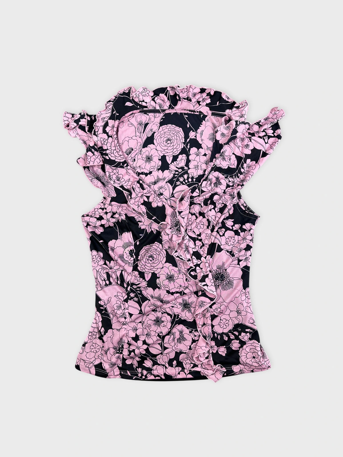 Detail view of a pink floral vintage corset dress featuring ruffled sleeves.