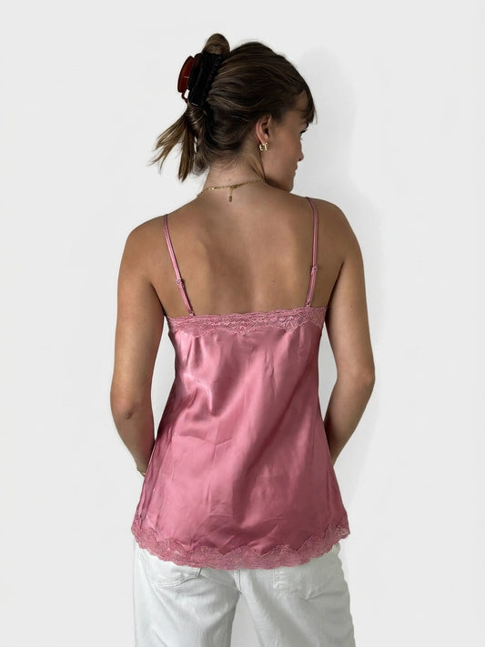 Back view of a pink camisole featuring lace trim detail.