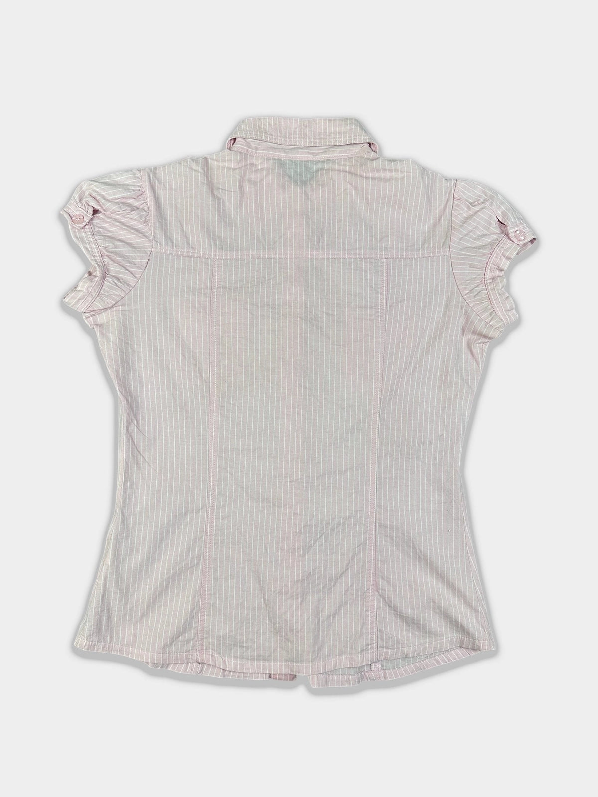 Back view of a short sleeve shirt in pink pinstripe pattern.