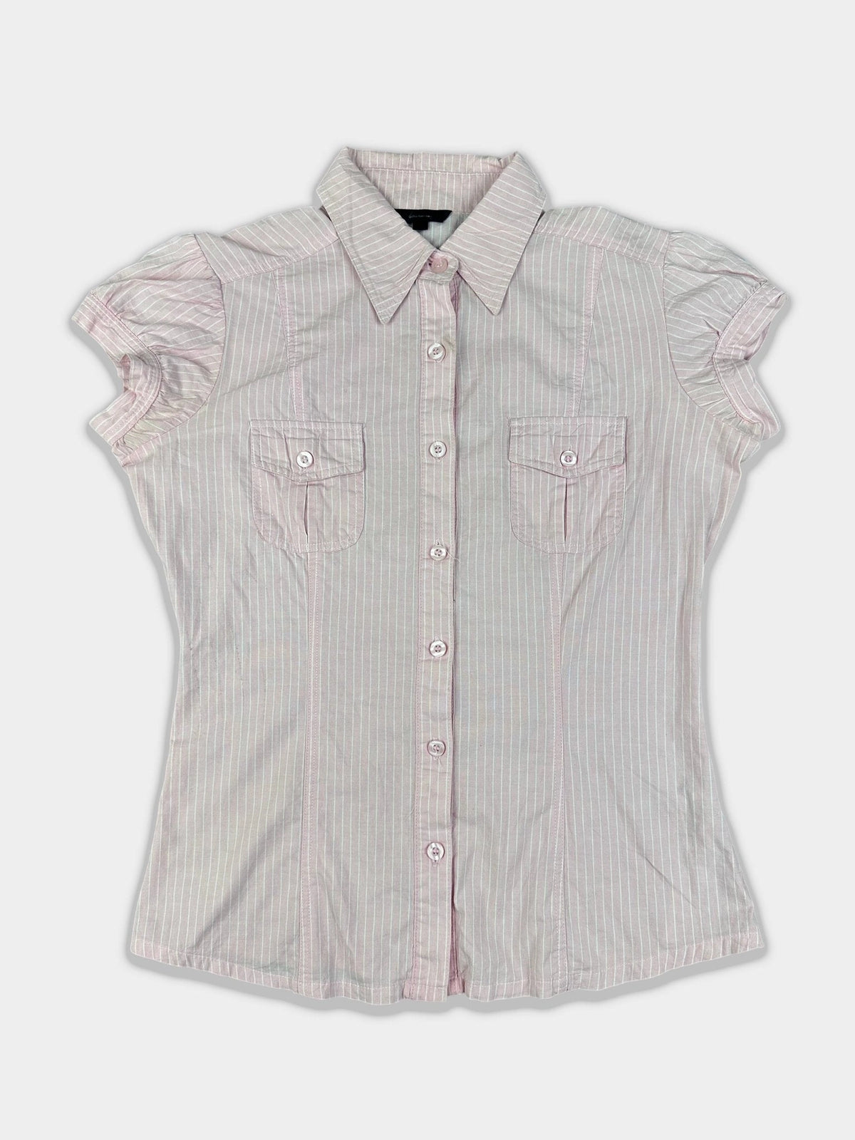 Front view of a pink pinstripe short sleeve shirt featuring front pockets.