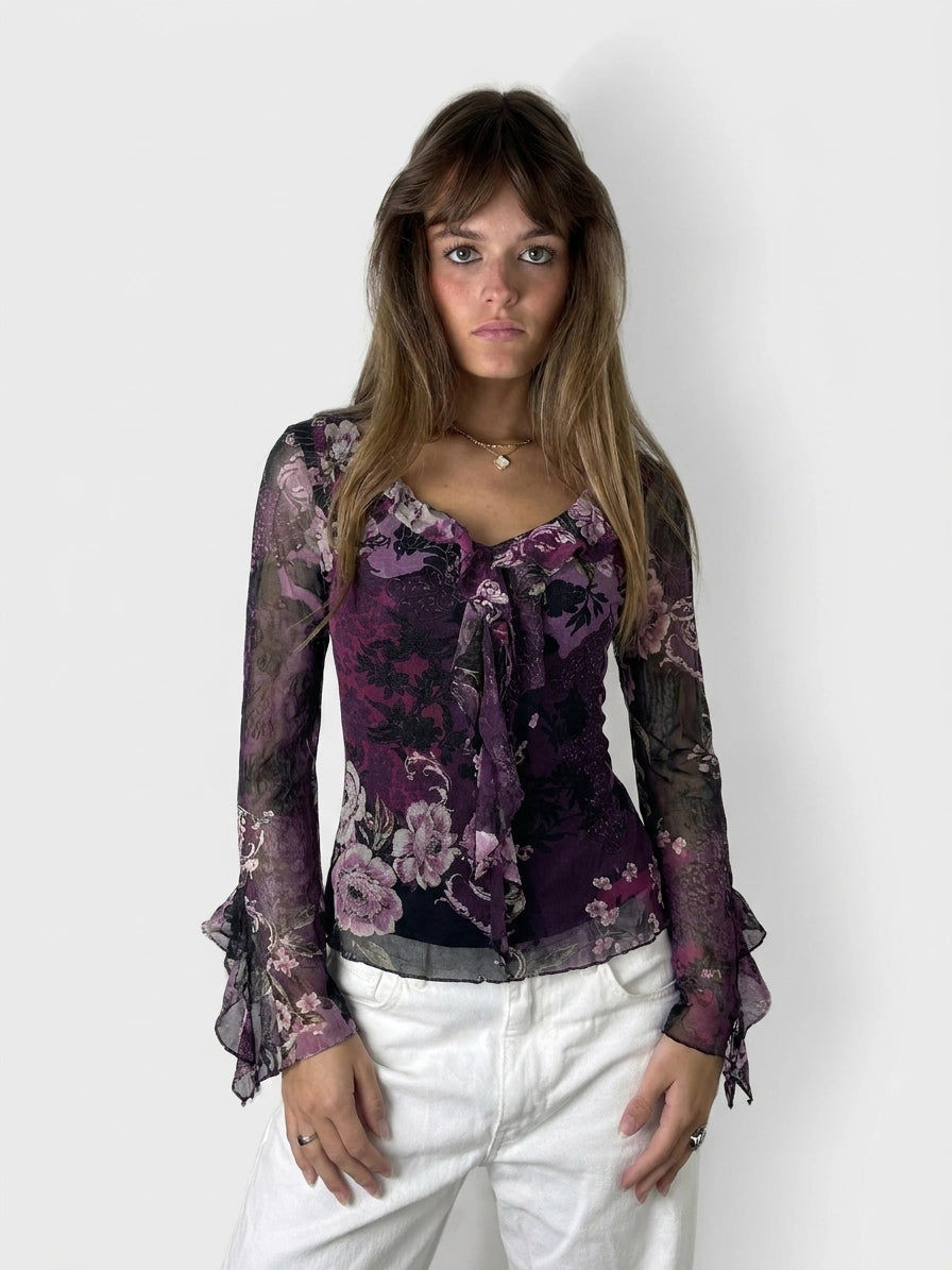 Purple floral lace top with bell sleeves, front view.
