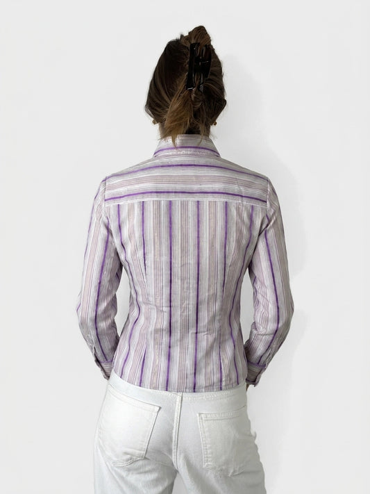 Back view of a fitted purple striped blouse with sheen.