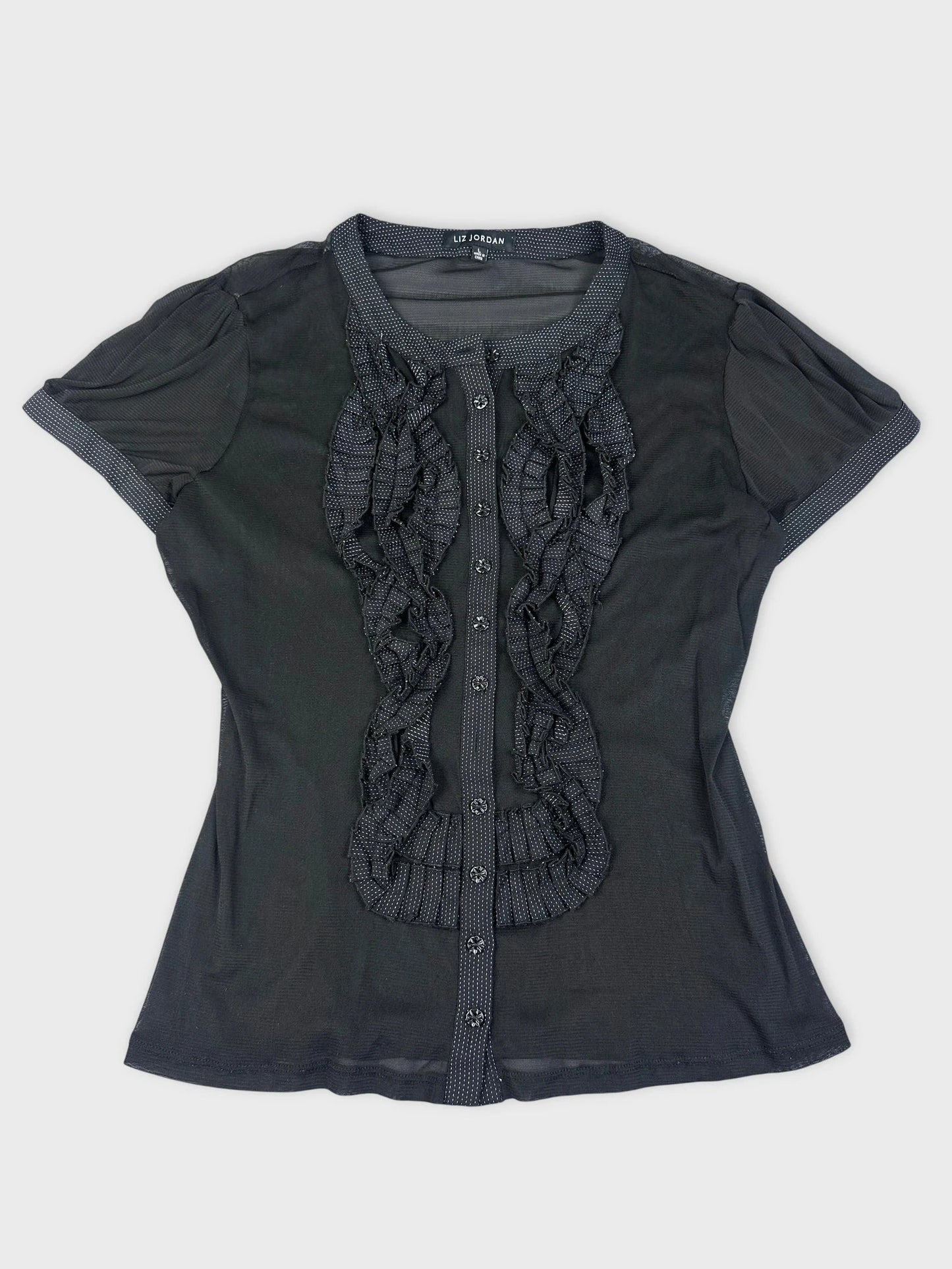 Sheer black button-up top with ruffle detail, front view.