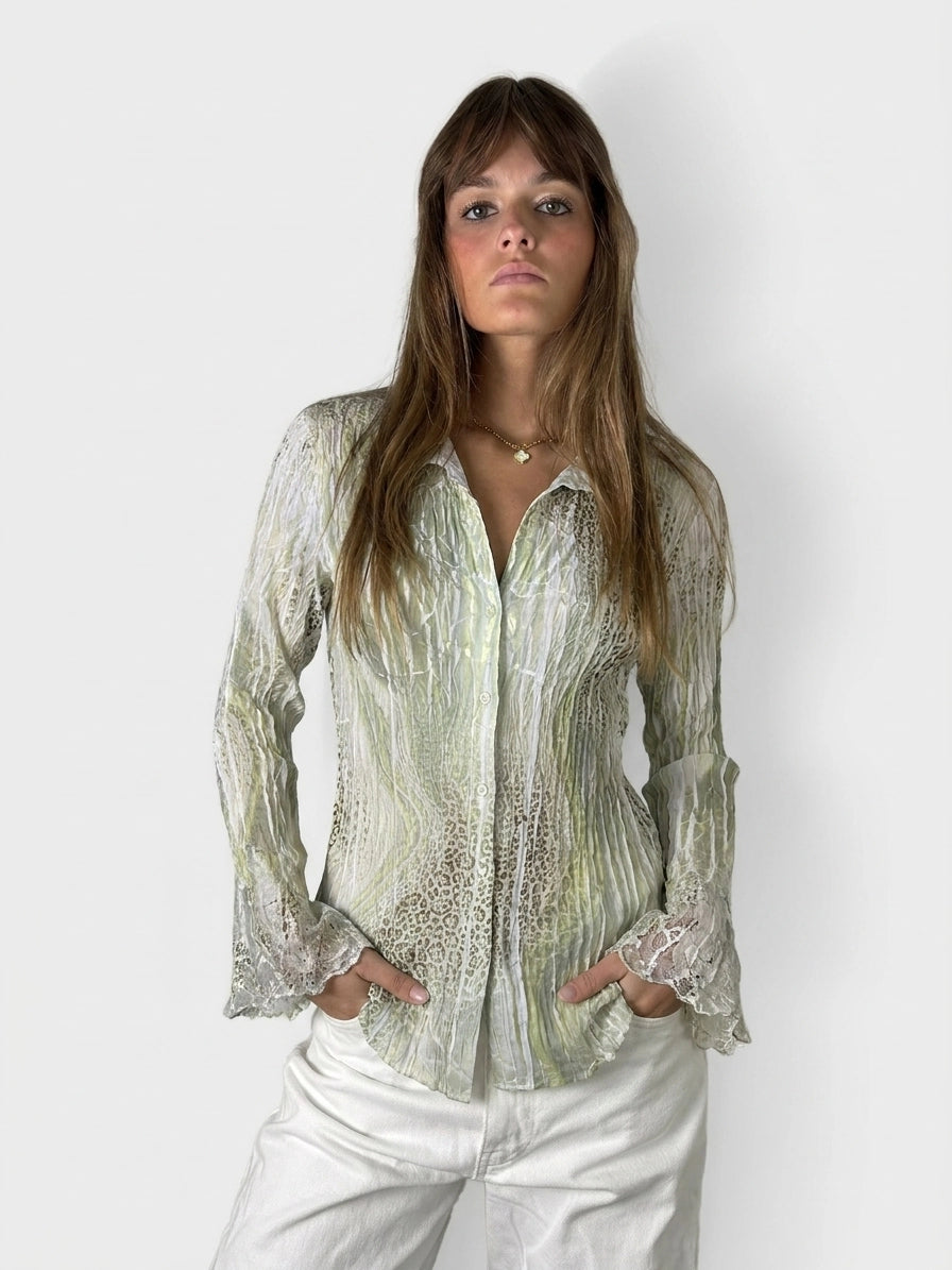 Sheer green button-up top with lace sleeves, front view, featuring a animal print pattern.
