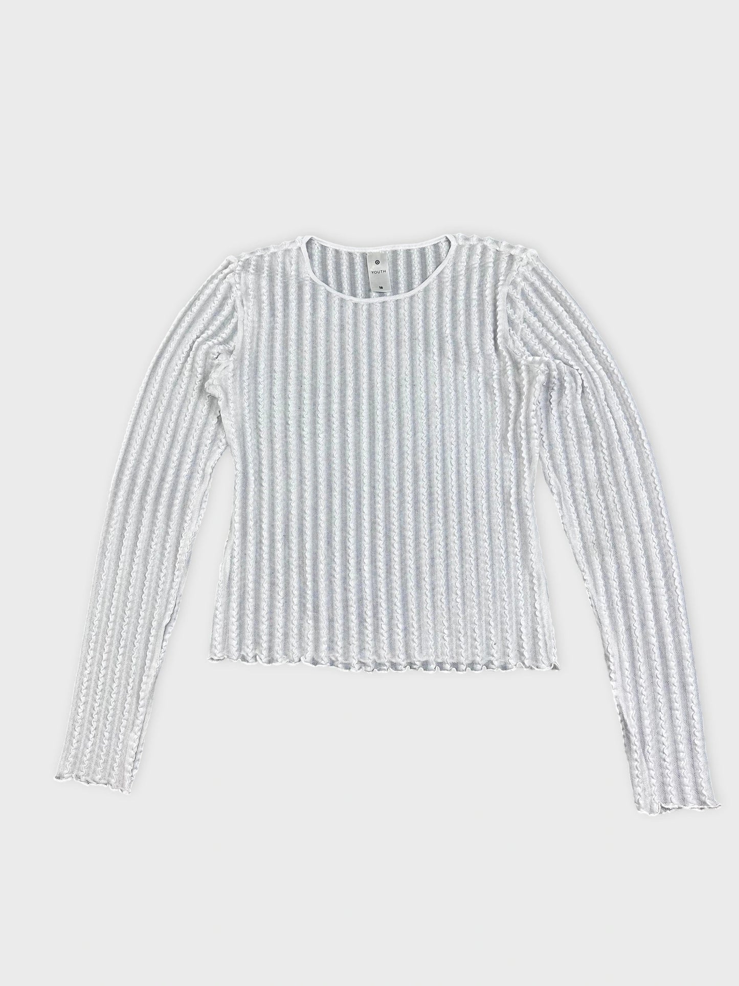 Front view of a white ribbed knit shirt with long sleeves.