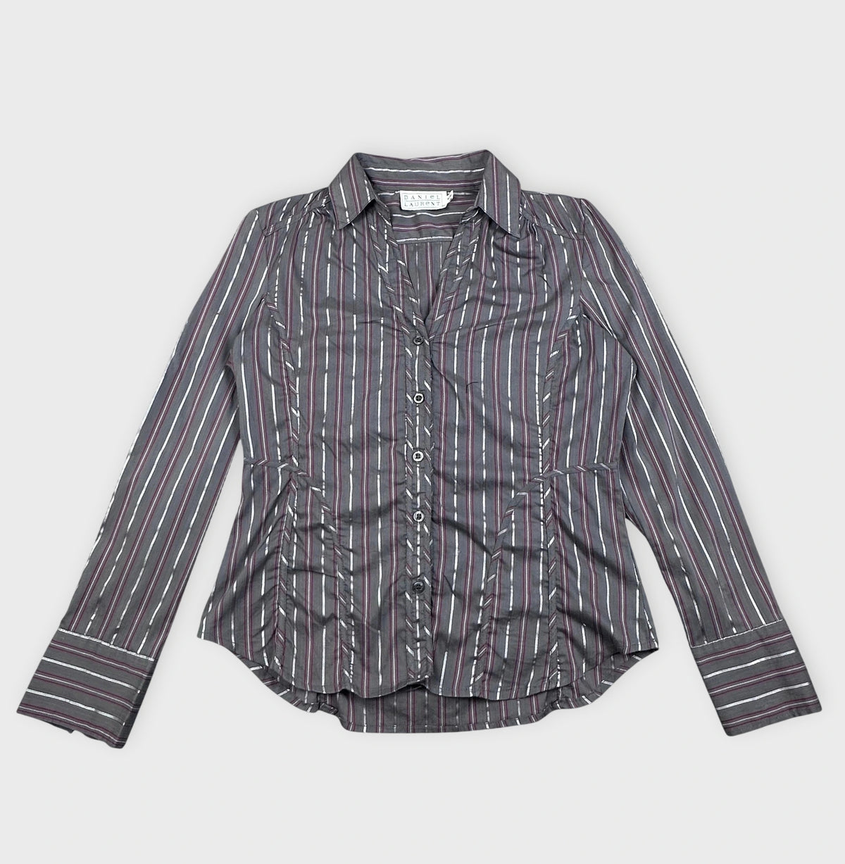 detail view of a striped long sleeve button-up shirt in gray with contrasting stripes