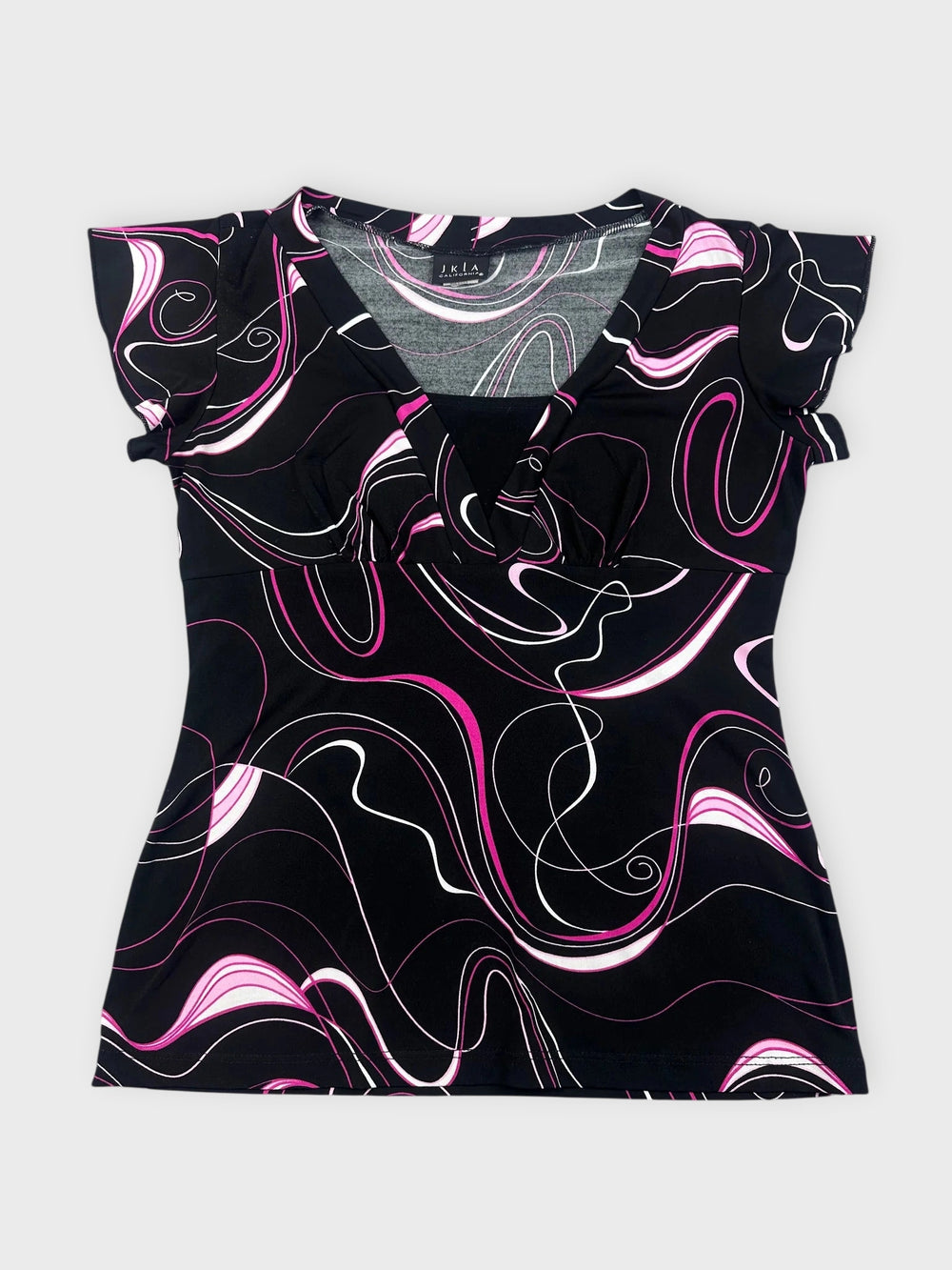 Front view of a black swirled graphic top featuring pink and white patterns.
