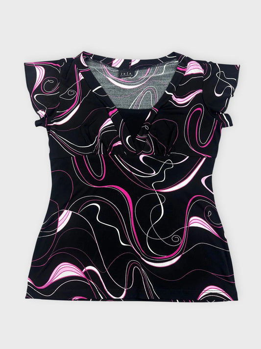 Front view of a black swirled graphic top featuring pink and white patterns.