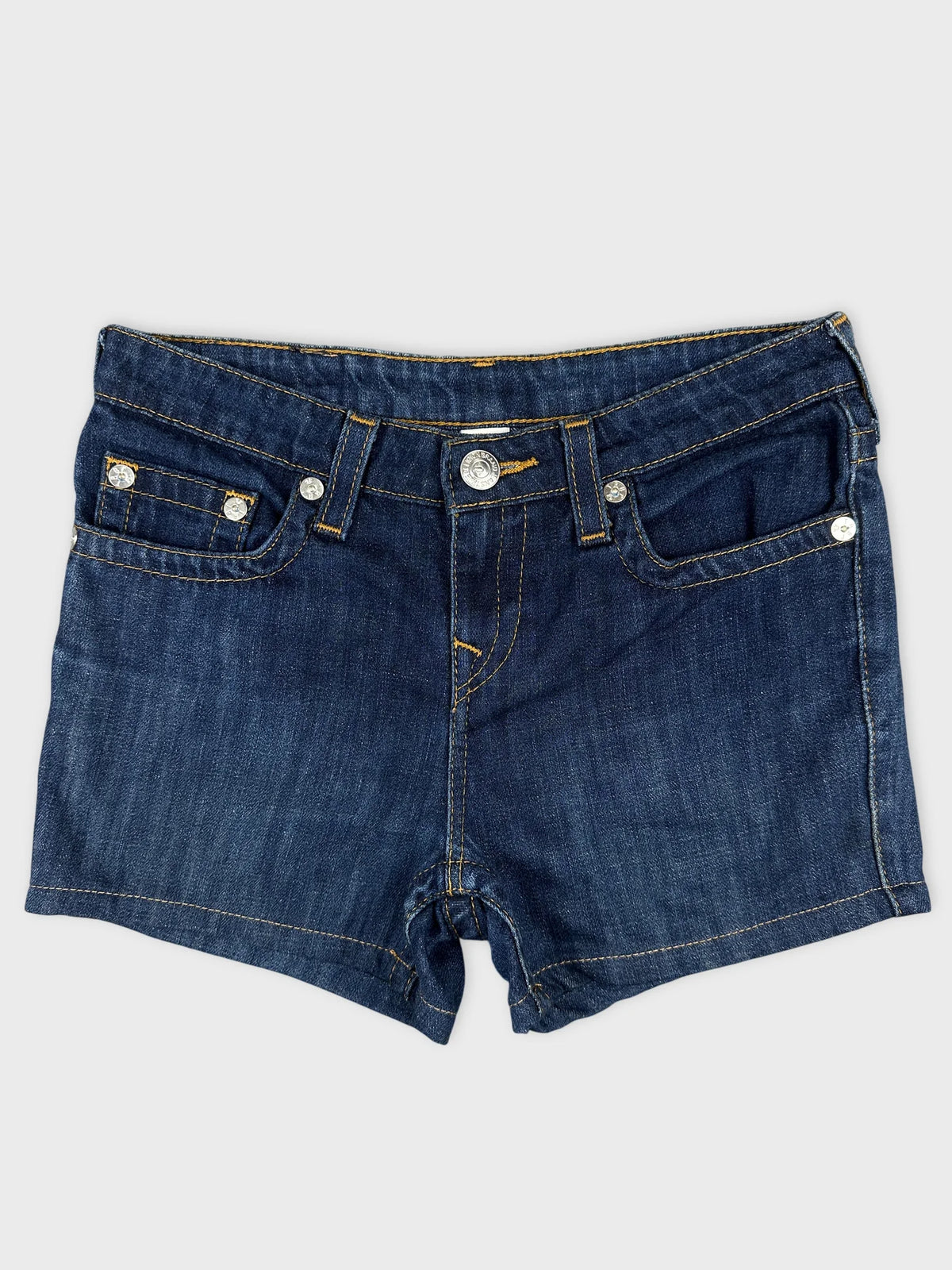 Front view of denim shorts in classic blue with pocket detailing.