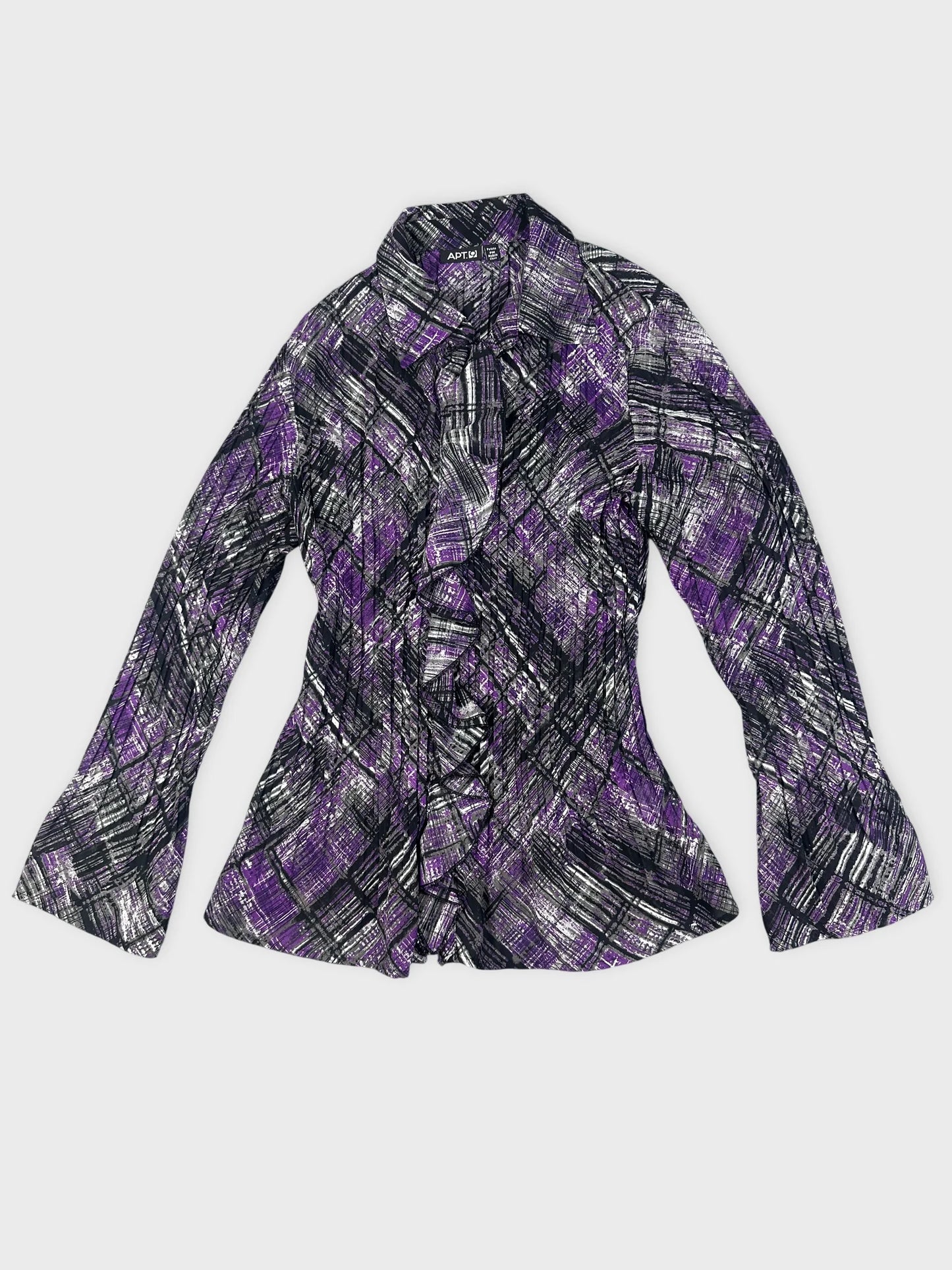 Detail view of a long-sleeve shirt in purple plaid pattern.