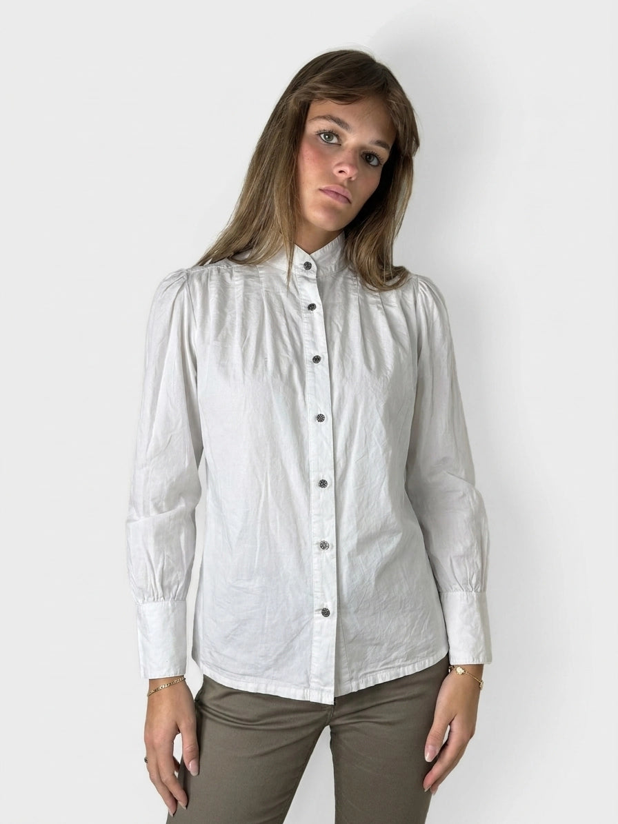 White long sleeve button-up shirt with puffed sleeves, front view.