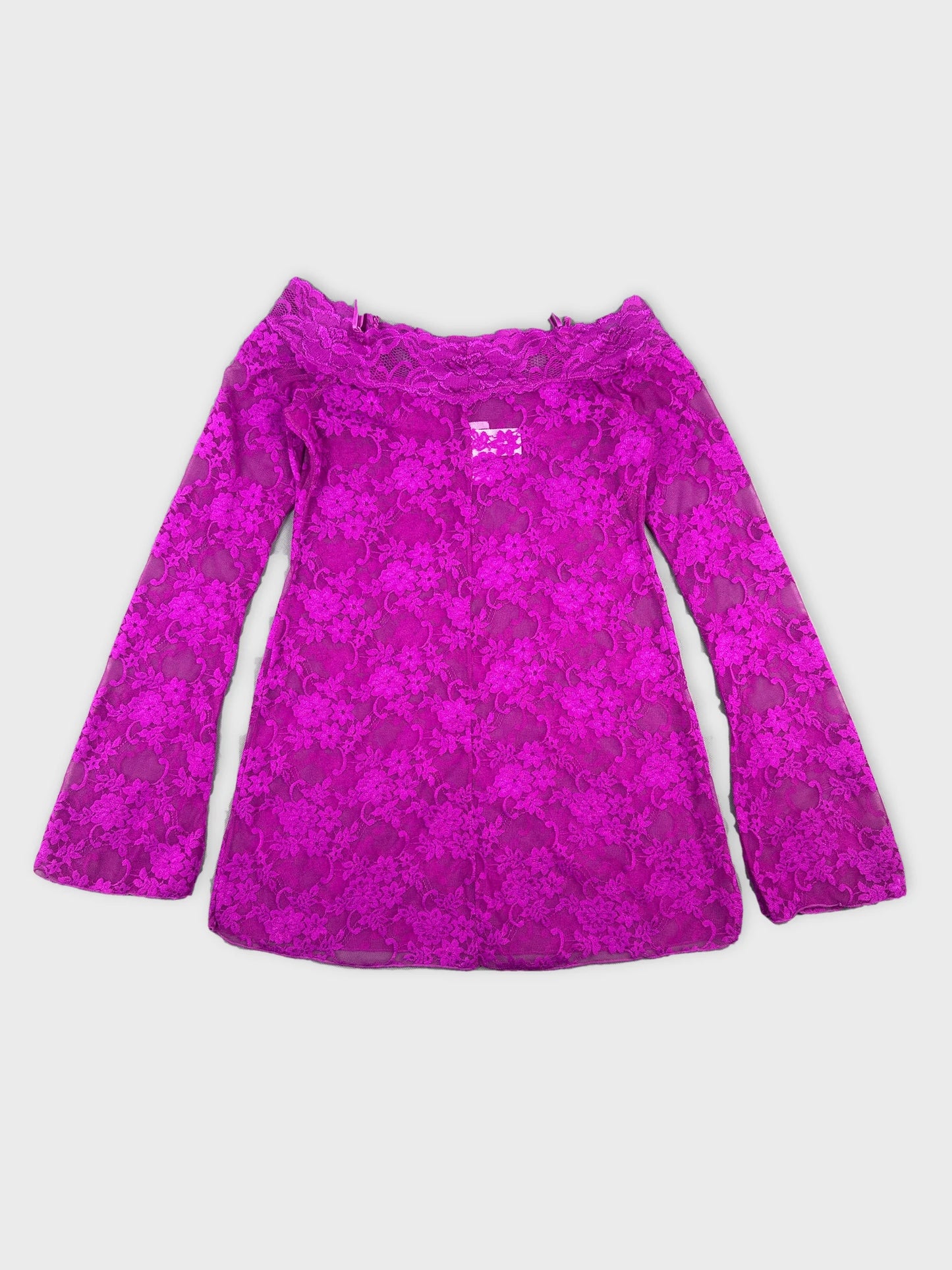Back view of a long-sleeve body shirt in bright pink lace fabric.