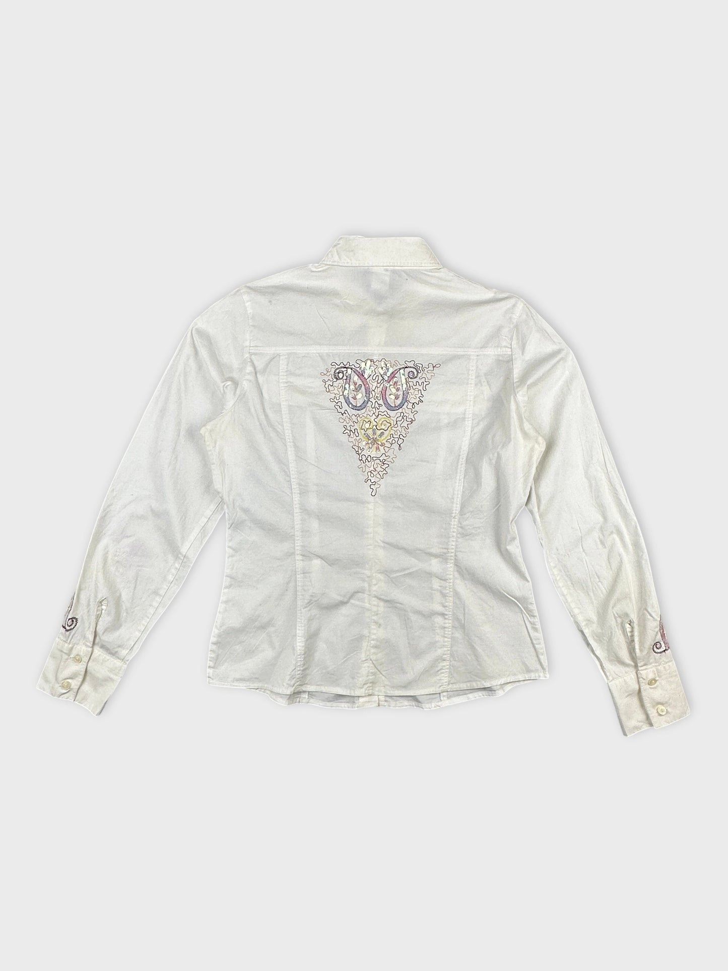 Back view of a white body shirt featuring intricate embroidery detail.