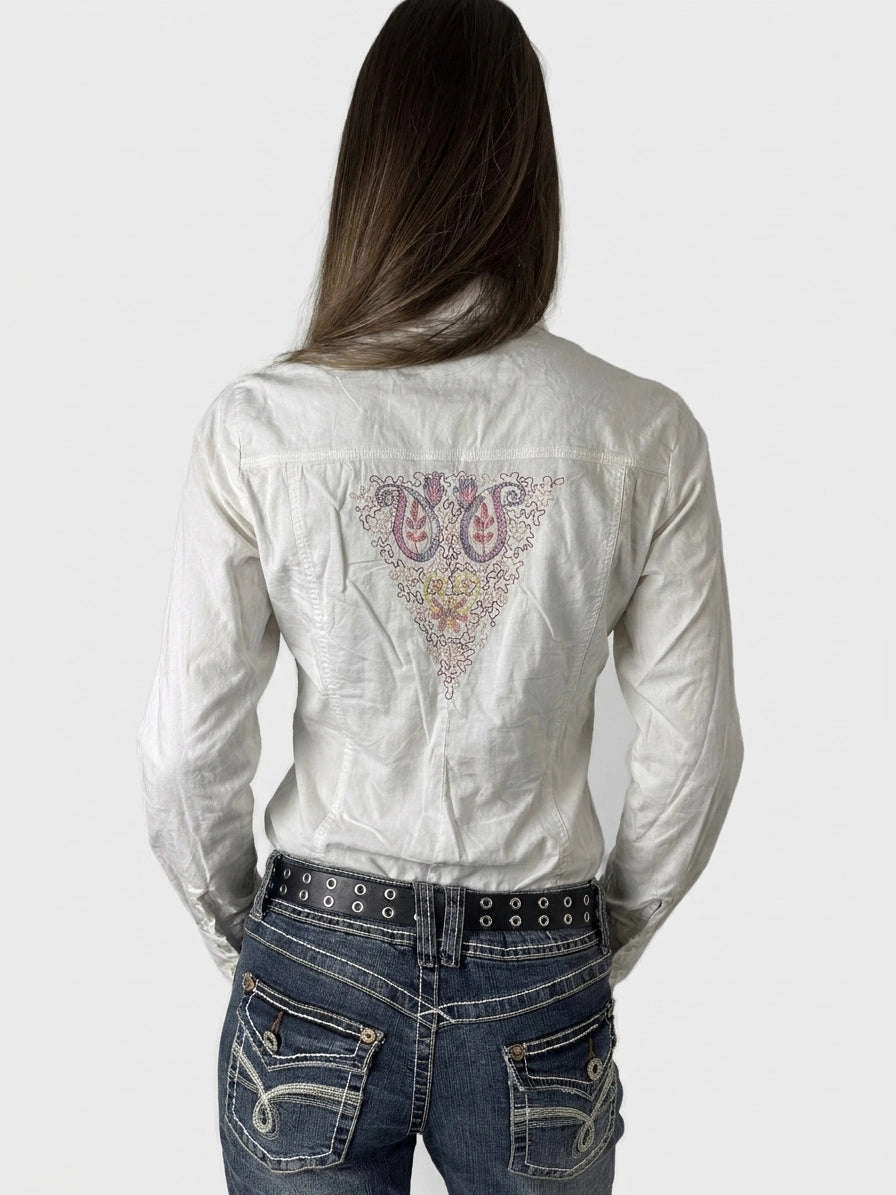 Back view of a white body shirt featuring intricate floral embroidery.