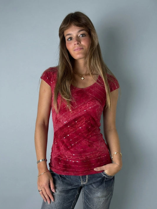 Front view of a red body shirt featuring a textured pattern.
