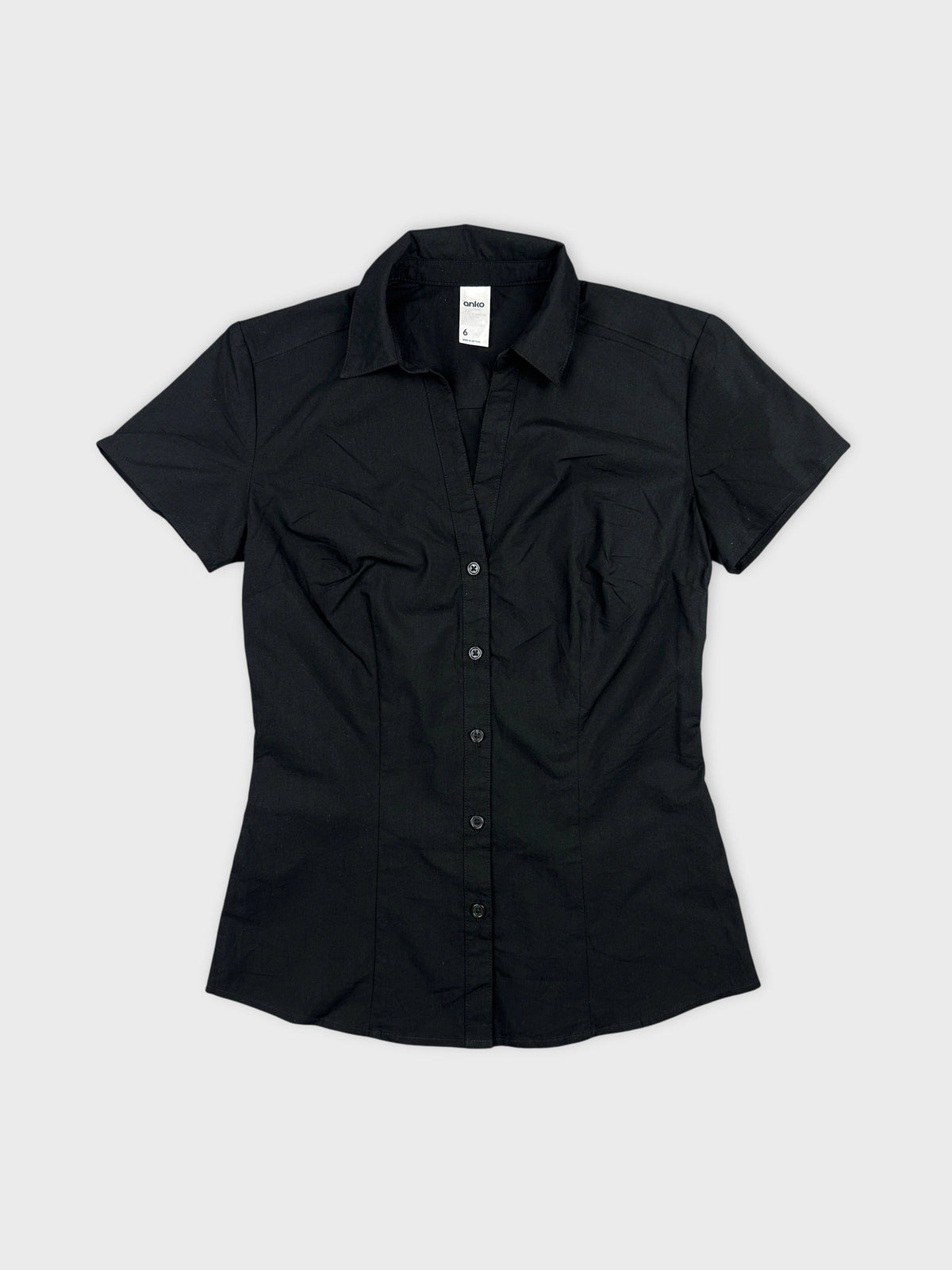 Black body shirt featuring a fitted design front view