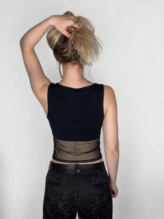 Black women's body shirt with sheer mesh detail, back view.