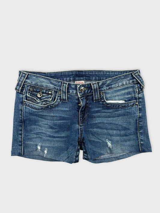 Front view of denim shorts featuring distressed details and a classic blue wash.