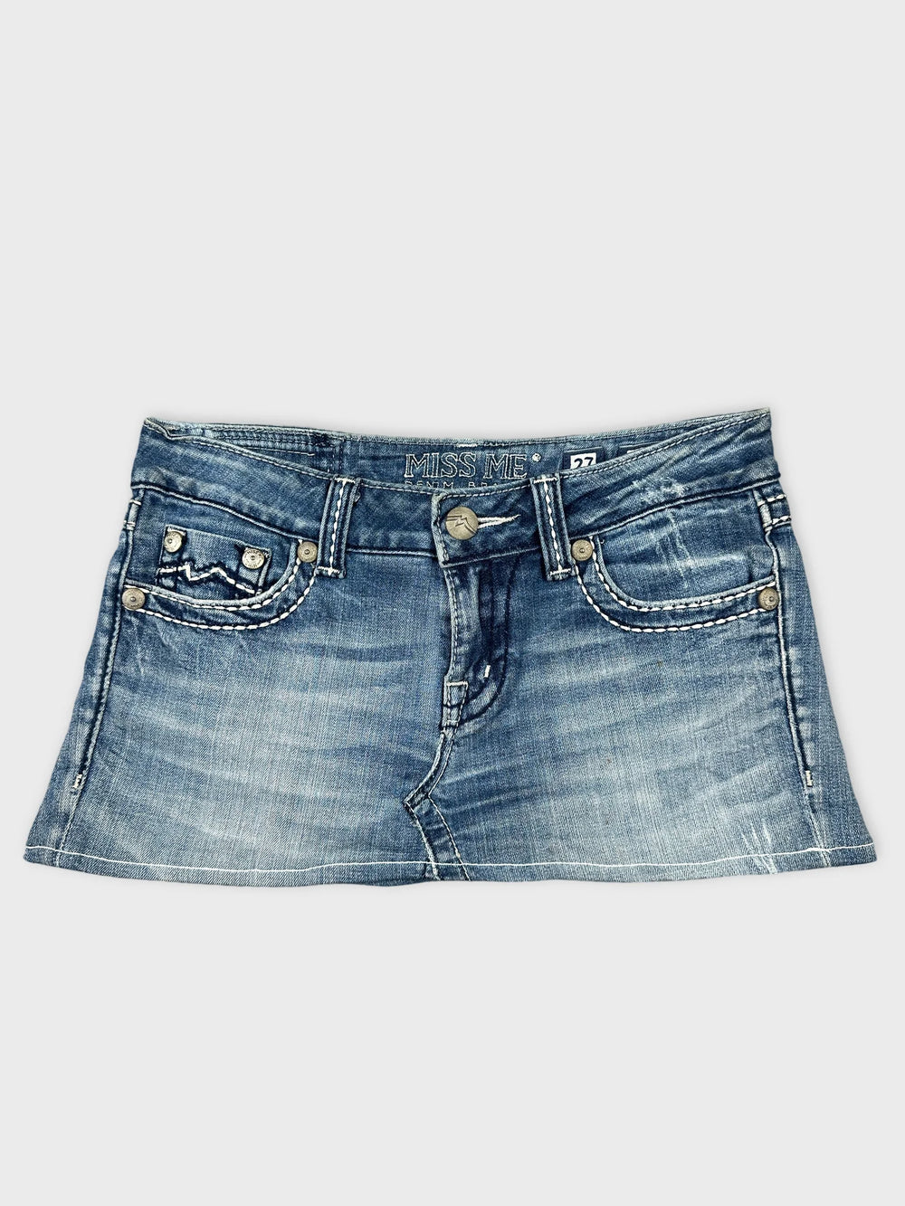 Front view of a denim skirt in light blue with stitching details.